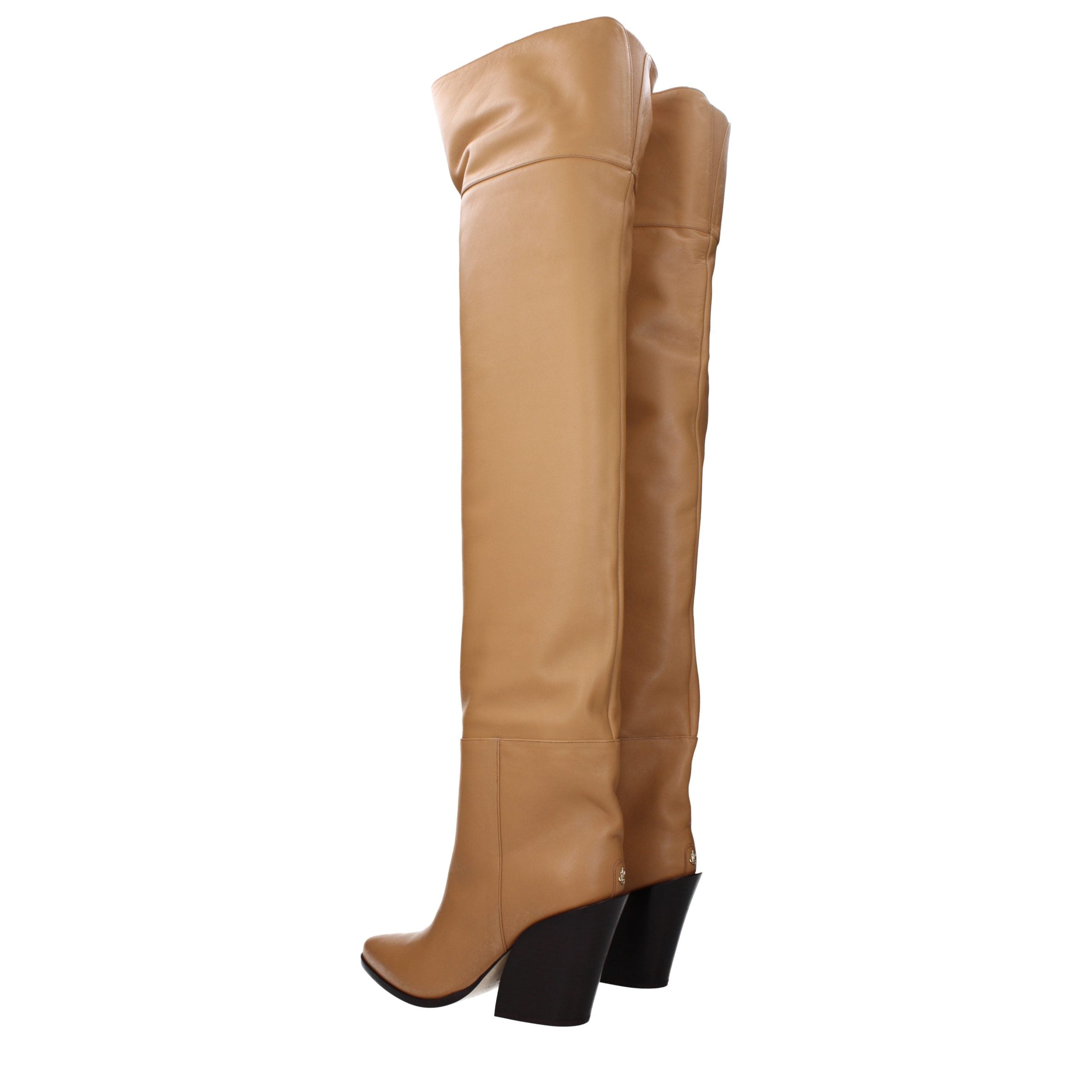 Elevate your style with Jimmy Choo Beige Leather Ankle Boots, where artisanal craftsmanship meets timeless elegance, perfect for the discerning individual.