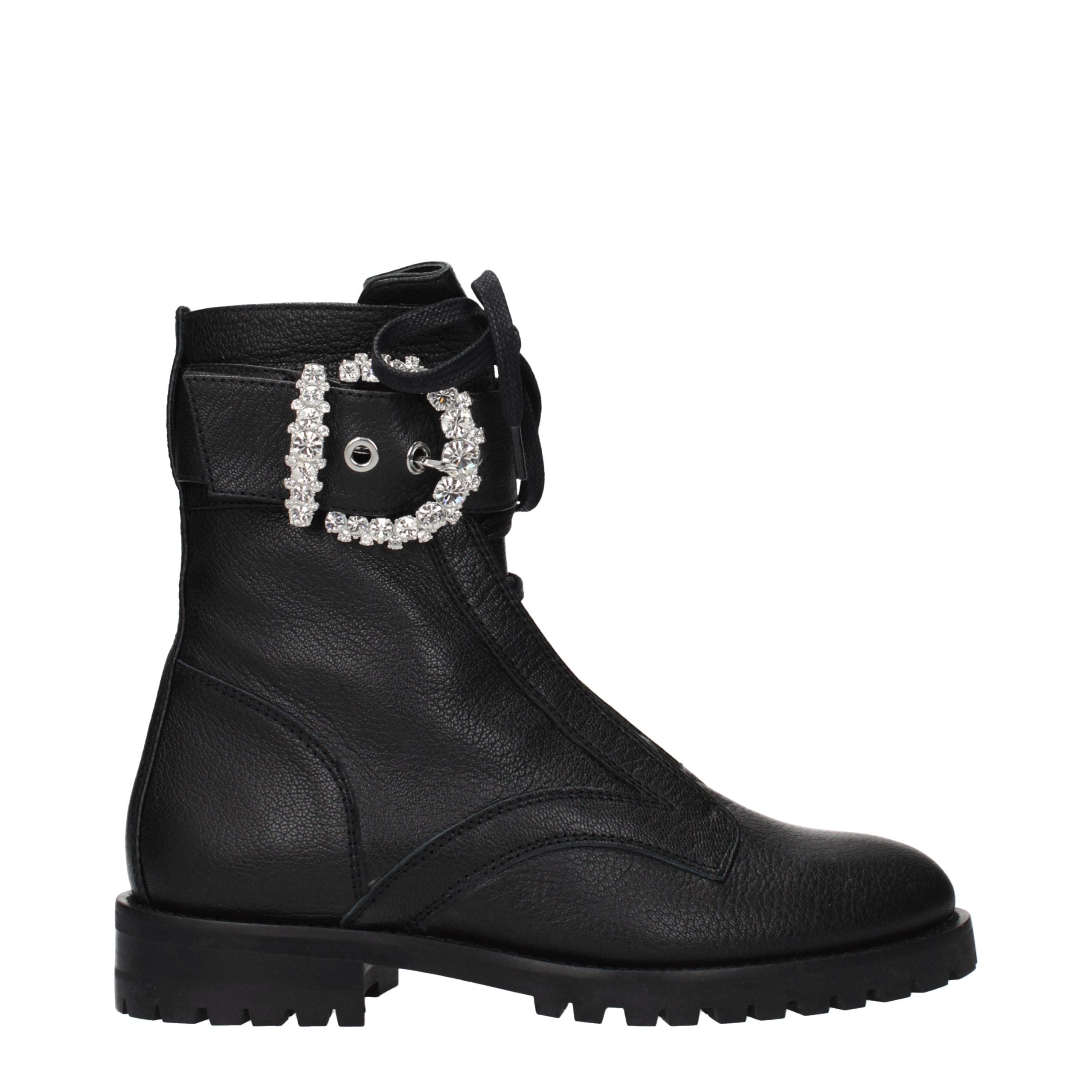 Experience the allure of Jimmy Choo Black Leather Ankle Boots, where exquisite craftsmanship meets timeless elegance, perfect for the discerning fashion connoisseur.