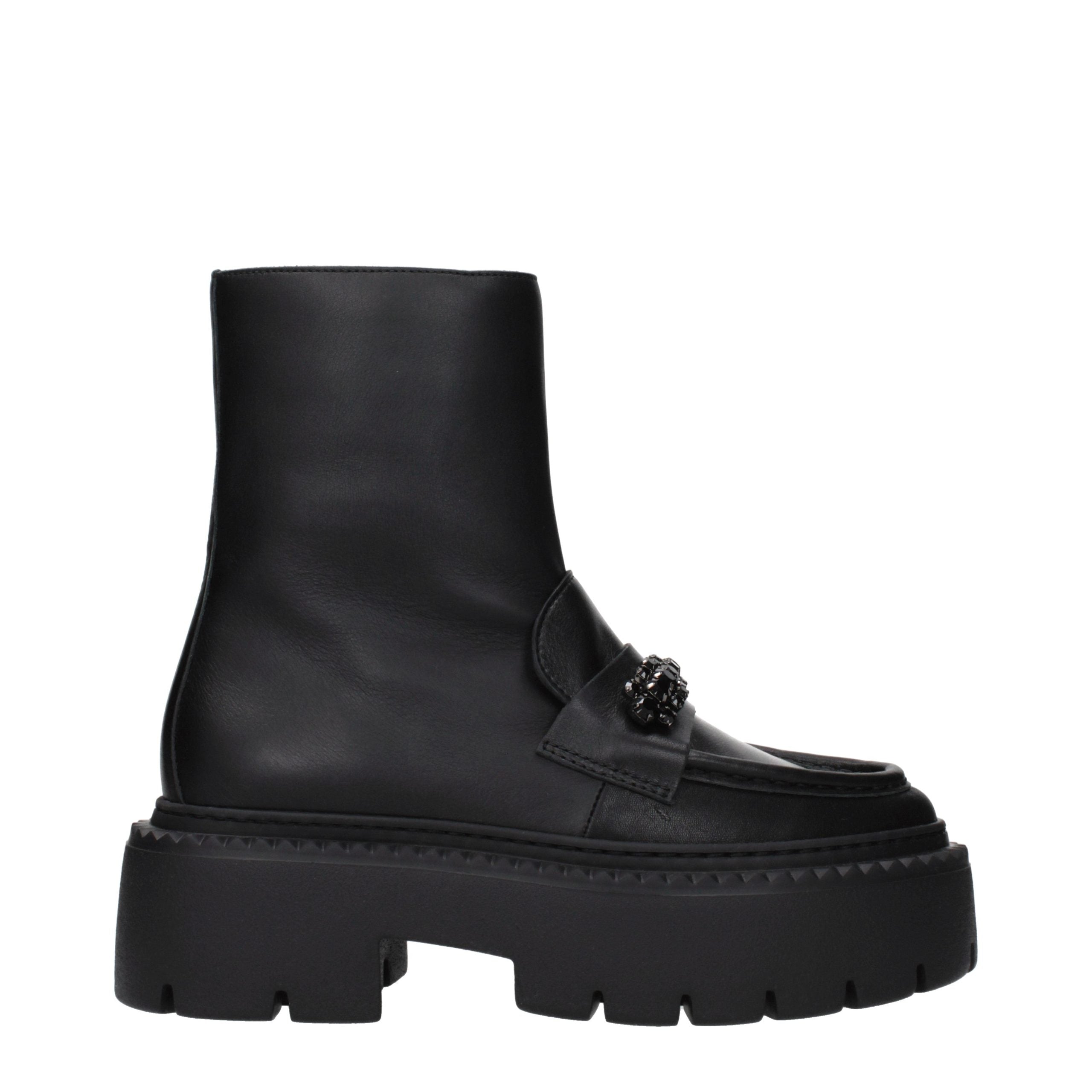 Elevate your style with Jimmy Choo Black Leather Ankle Boots, where exquisite craftsmanship meets modern sophistication for the discerning individual who values luxury.