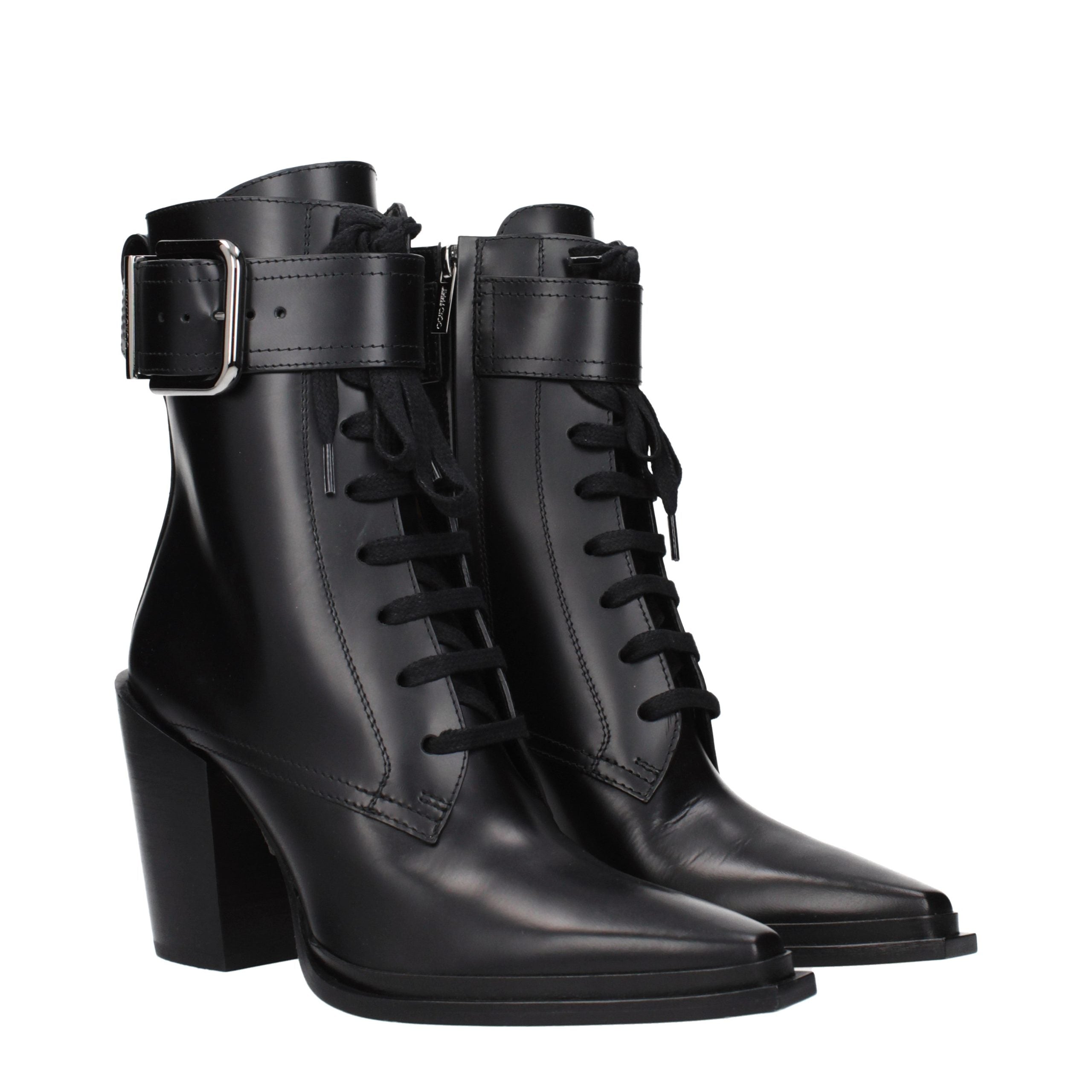Step into the realm of sophistication with Jimmy Choo Black Leather Ankle Boots, where exquisite craftsmanship meets timeless elegance, perfect for any discerning wardrobe.