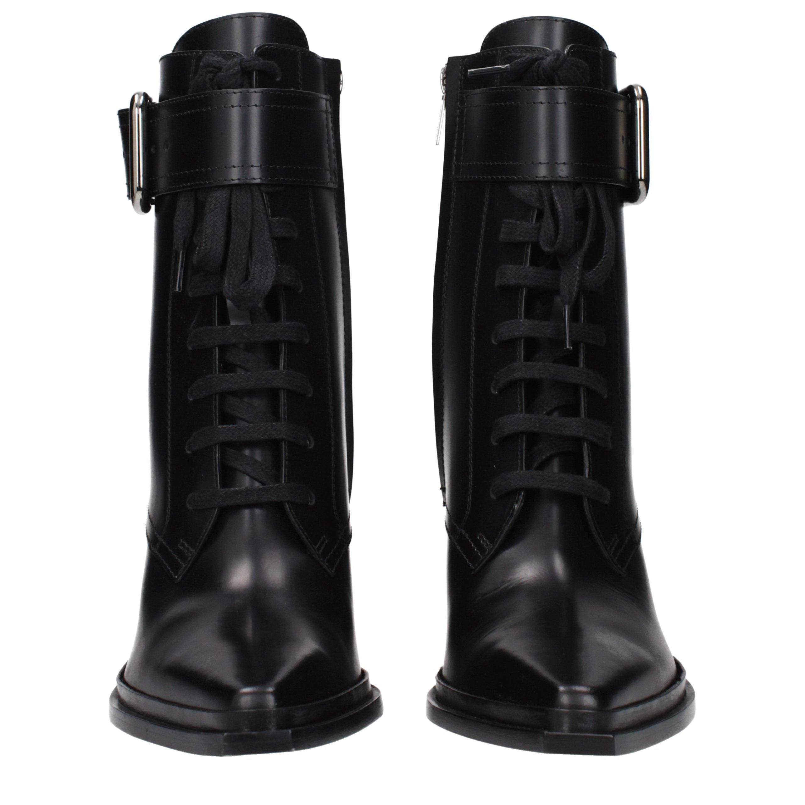 Step into the realm of elegance with Jimmy Choo Black Leather Ankle Boots, where exquisite craftsmanship meets timeless allure, perfect for any sophisticated occasion.