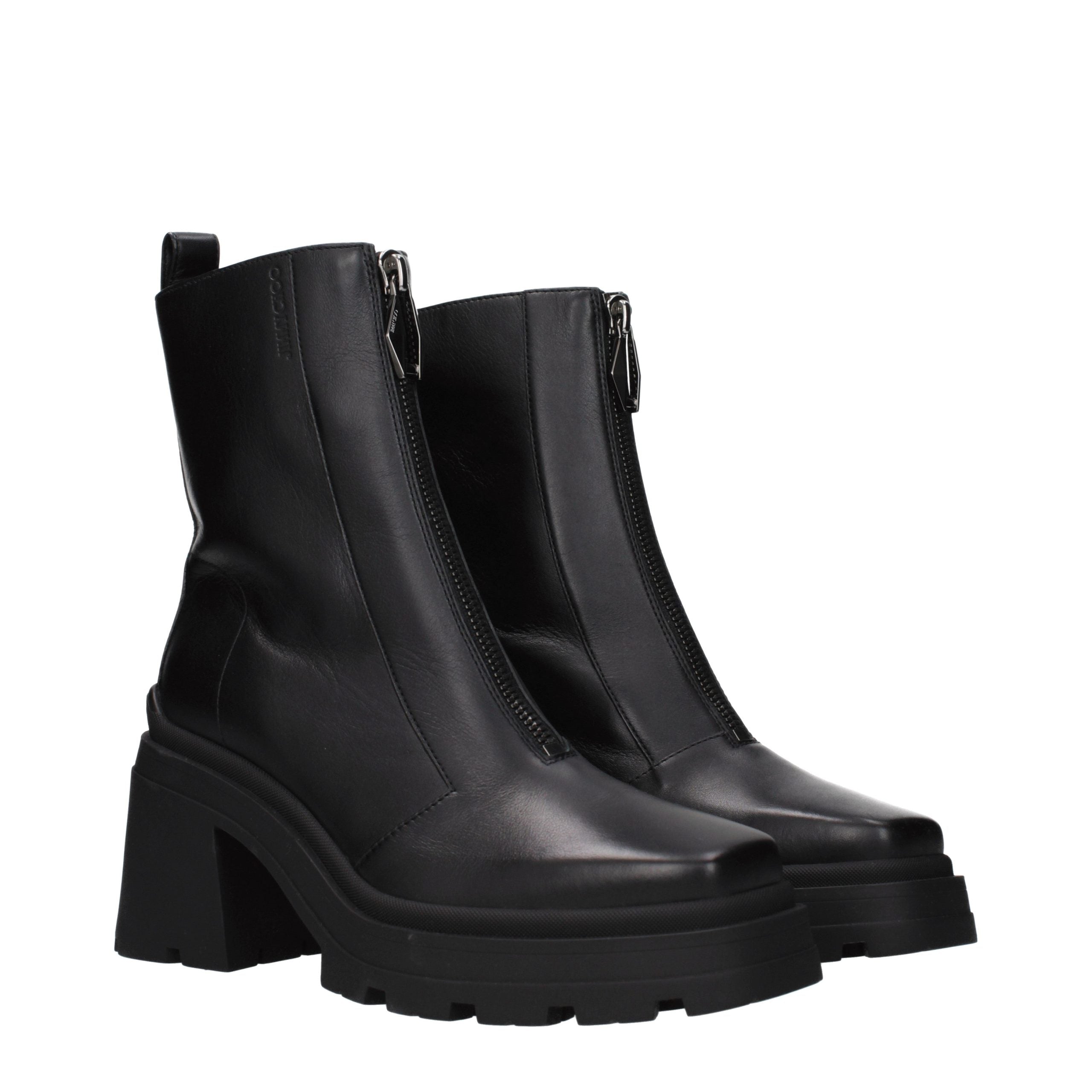 Step into timeless elegance with Jimmy Choo Black Leather Ankle Boots, where exquisite craftsmanship meets unparalleled luxury, perfect for the discerning connoisseur.