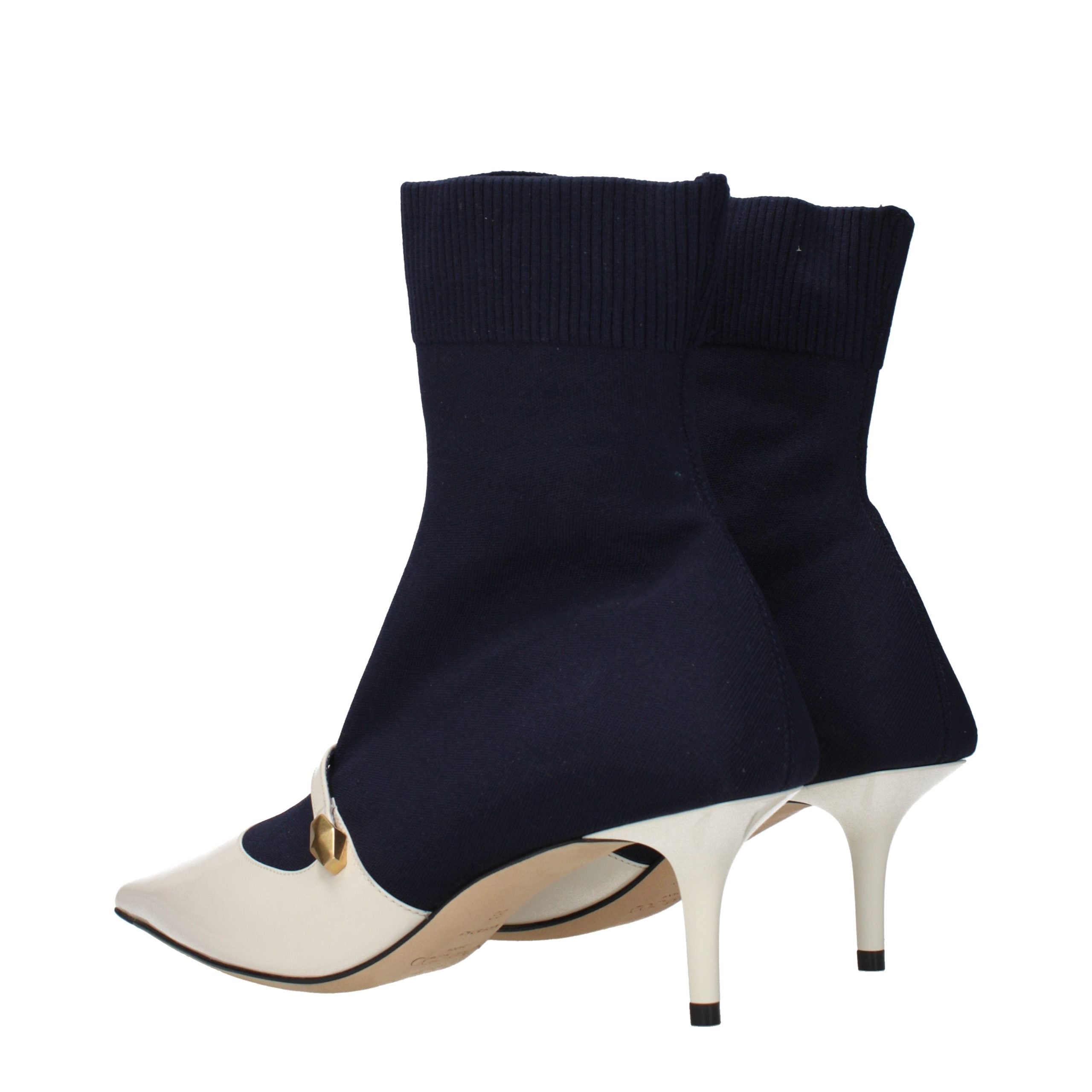 Step into a realm of refined elegance with Jimmy Choo Blue Fabric Ankle Boots, where exquisite craftsmanship meets timeless allure, perfect for the discerning fashion connoisseur.