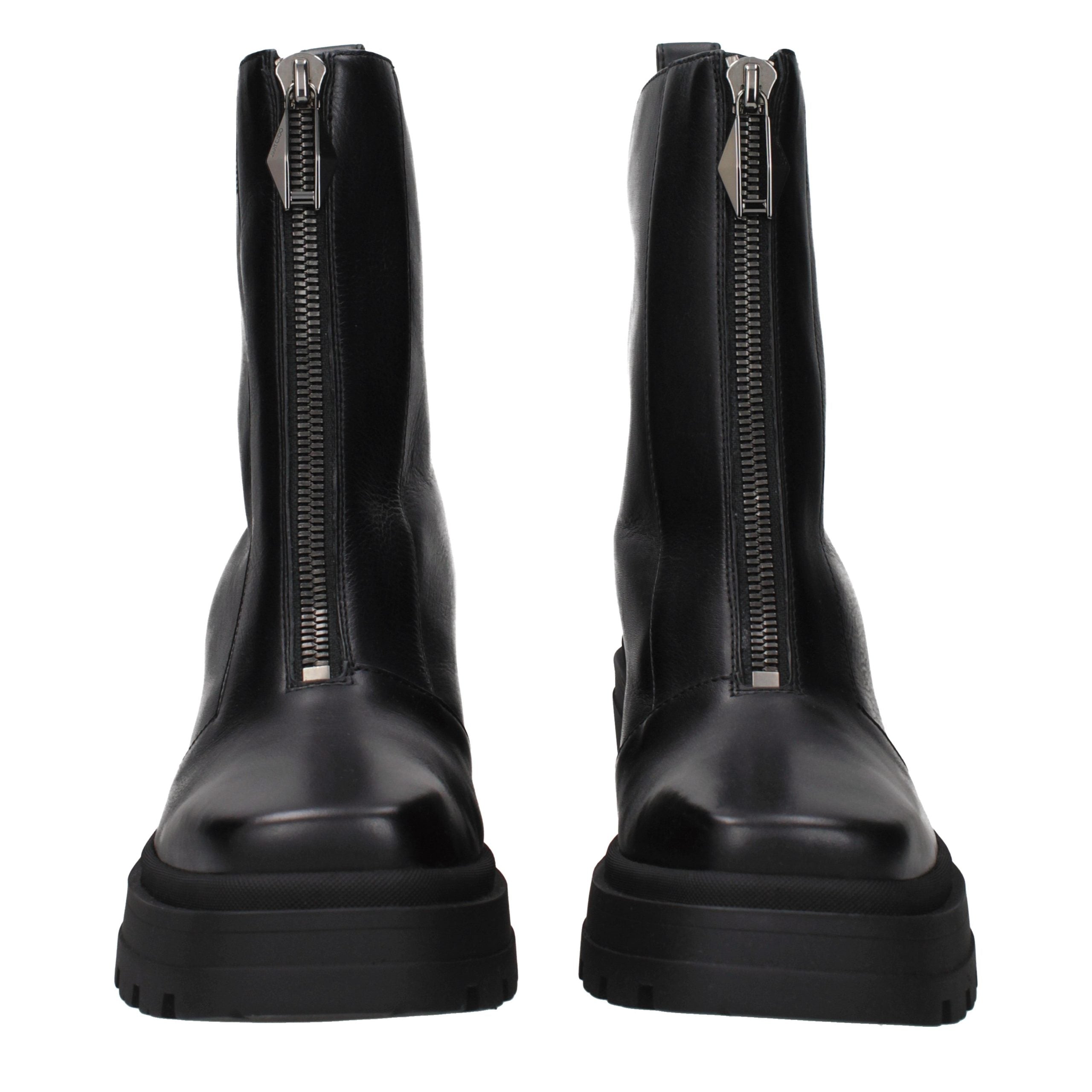 Step into the realm of sophistication with Jimmy Choo Black Leather Ankle Boots, where exquisite craftsmanship meets timeless elegance, perfect for the discerning connoisseur.