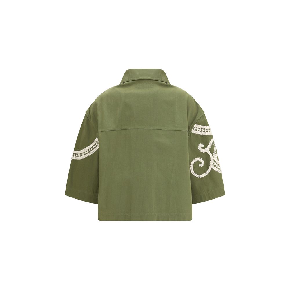Elevate your wardrobe with the Max Mara Bicolor Cotton Coat, a masterpiece of 100% cotton that embodies effortless luxury and refined elegance for every occasion.