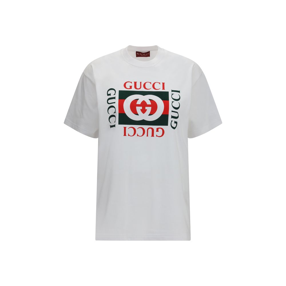 Discover the Gucci White Cotton T-Shirt, a masterpiece of luxury crafted from premium cotton, embodying timeless elegance and sophistication for the discerning individual.