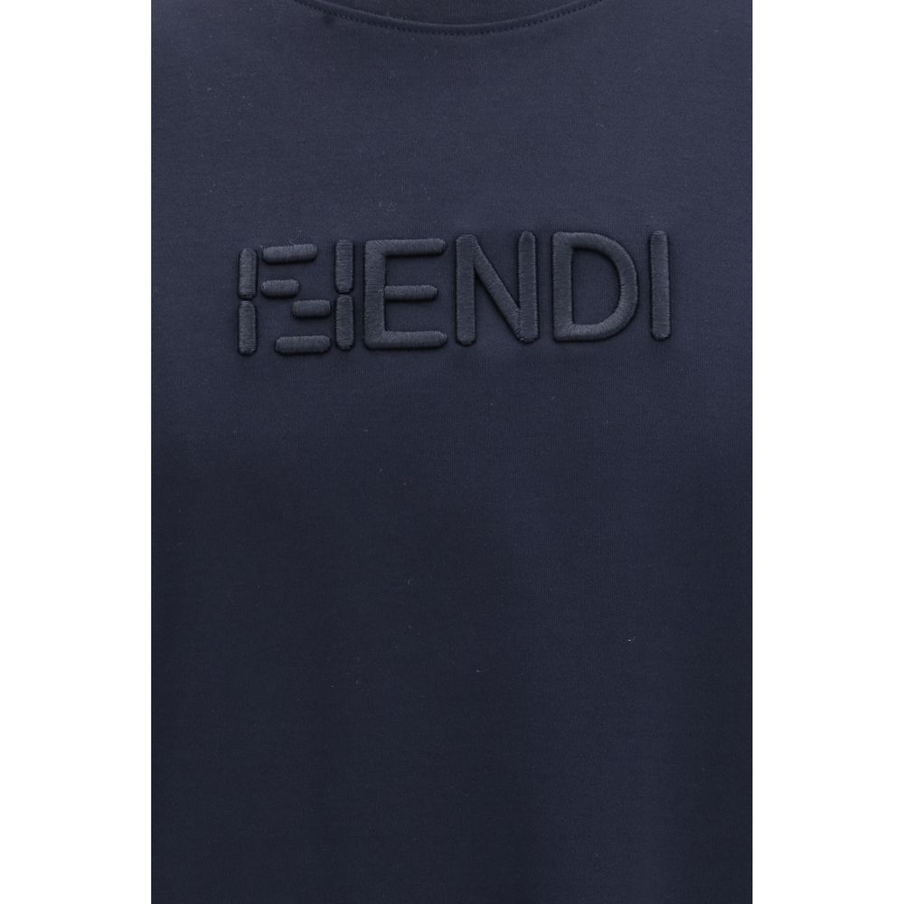 Experience the allure of the Fendi Blue Cotton T-Shirt, a luxurious embodiment of Italian craftsmanship, perfect for elevating any refined wardrobe with effortless sophistication.