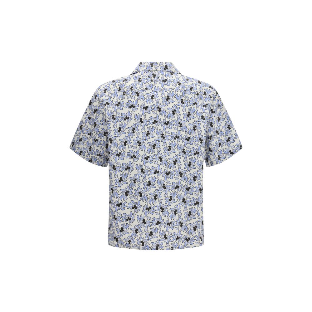 Experience the allure of the Prada Multicolor Cotton Pattern Shirt, where luxurious cotton-silk blend meets exquisite floral artistry for effortless sophistication.
