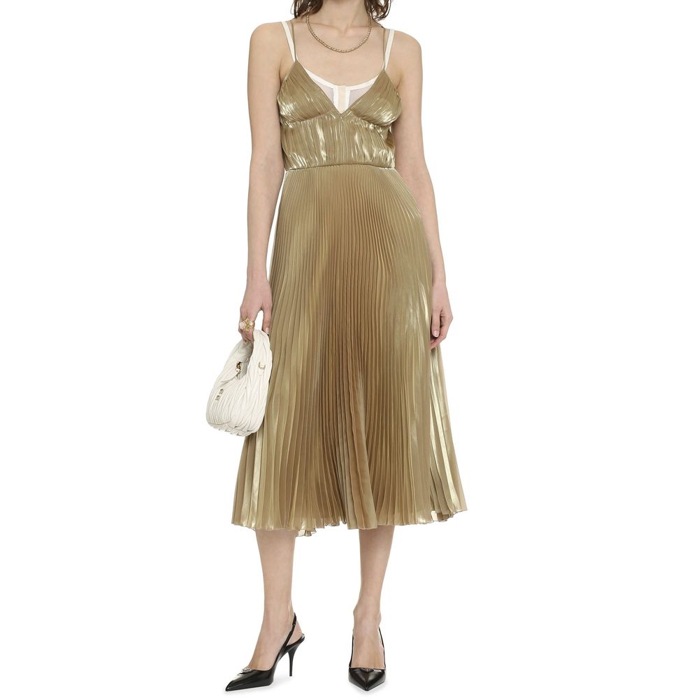 Discover the Prada Gold Polyester Casual Dress, a masterpiece of Italian craftsmanship that embodies elegance and sophistication for every occasion.