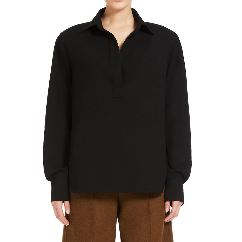 Elevate your wardrobe with the Max Mara Black Cotton Dress Shirt, a timeless piece crafted in Italy from premium cotton, embodying effortless elegance and sophistication.