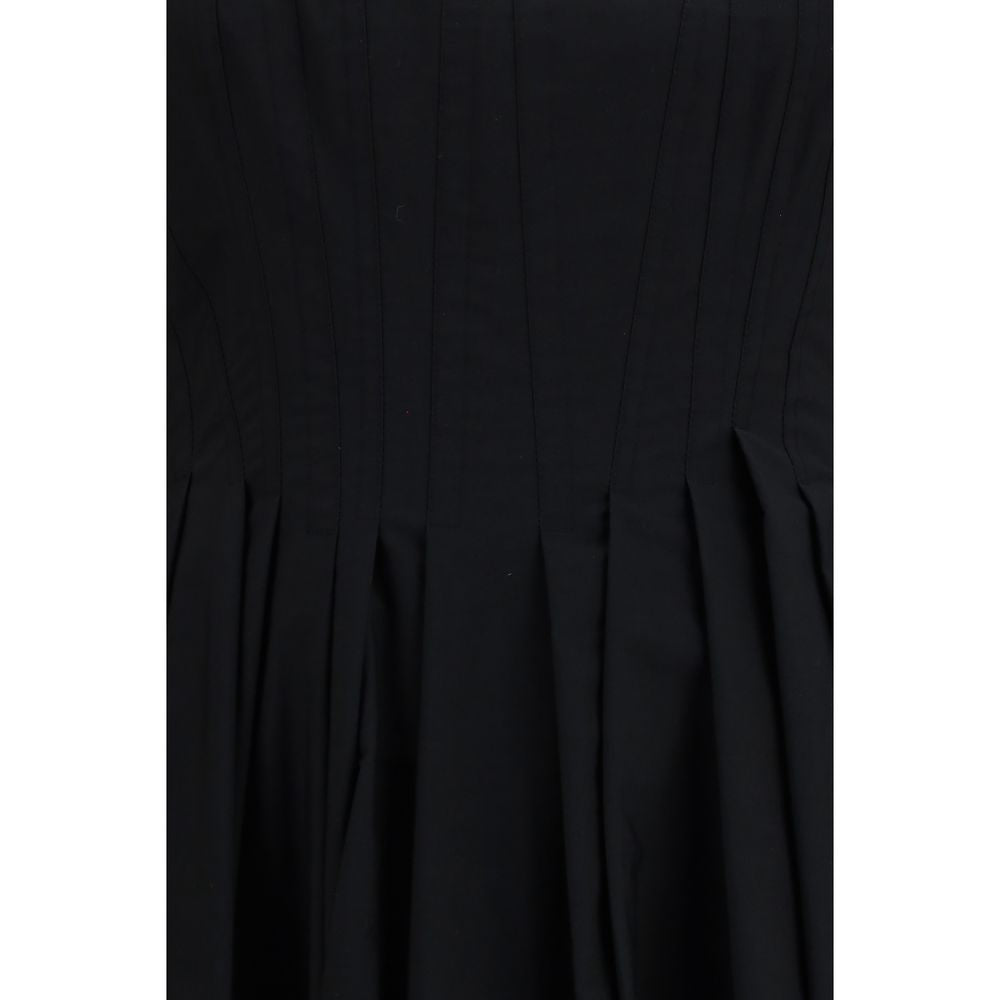 Experience the allure of the Max Mara Black Cotton Casual Dress, a timeless masterpiece in heavy washed cotton, embodying elegance and sophistication for any refined wardrobe.