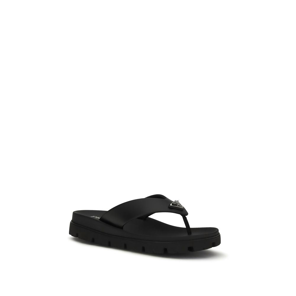 Step into unparalleled elegance with Prada's Brown Calf Leather Bos Taurus Flip-Flop Sandals, crafted for the discerning individual who values luxury and sophistication.