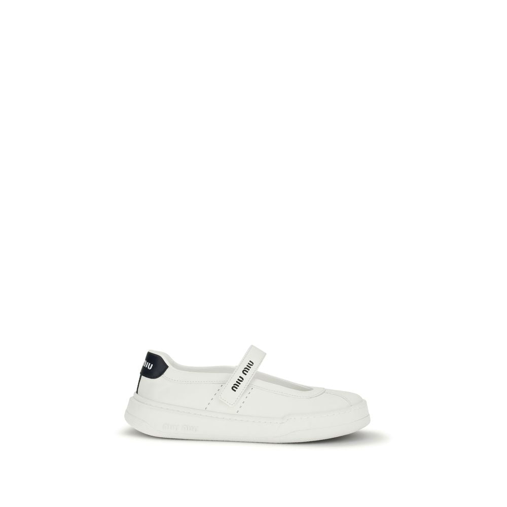 Discover Miu Miu's White Calf Leather Bos Taurus Ballet Flats, where exquisite craftsmanship meets timeless elegance, perfect for the discerning individual.