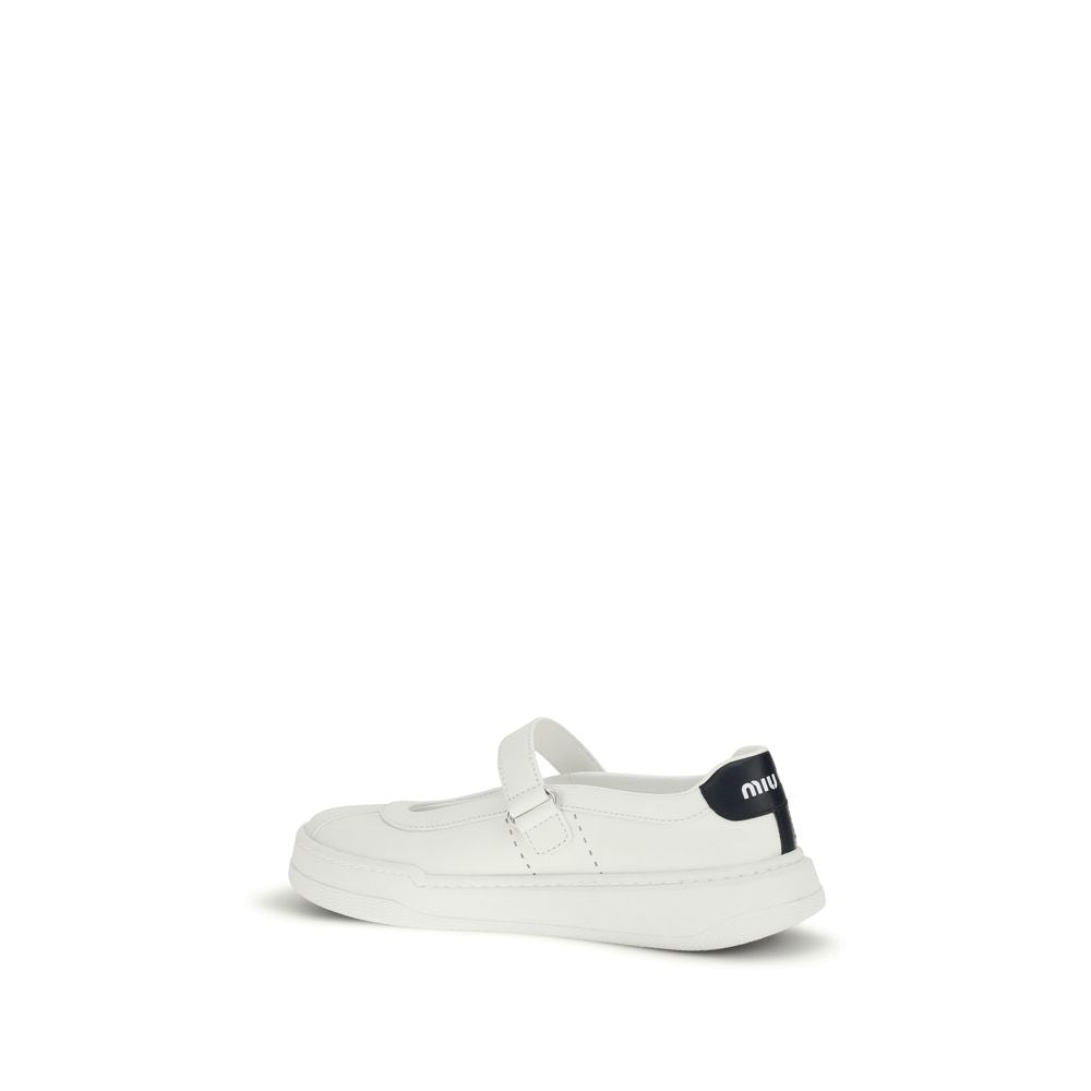 Discover the exquisite Miu Miu White Calf Leather Bos Taurus Ballet Flats, where luxurious craftsmanship meets timeless elegance for the discerning individual.