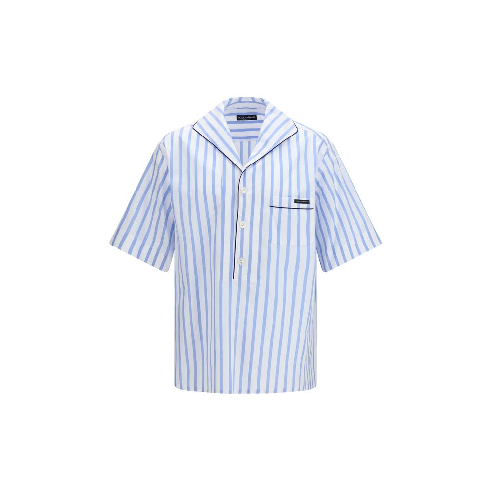 Elevate your wardrobe with the Dolce & Gabbana Multicolor Cotton Pattern Shirt, a blend of 98% cotton and 2% silk, embodying timeless elegance and artisanal craftsmanship.