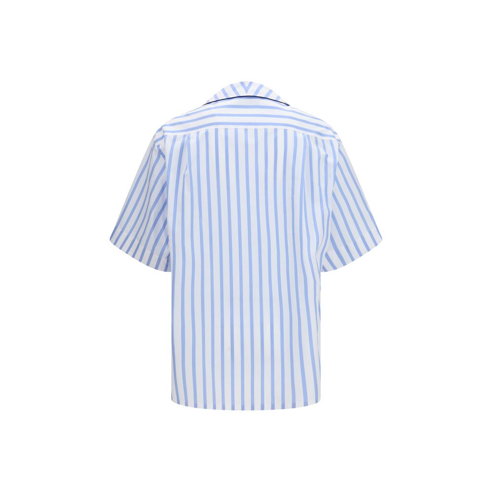 Elevate your wardrobe with the Dolce & Gabbana Multicolor Cotton Pattern Shirt, a masterpiece of artisanal craftsmanship and luxurious materials for the discerning individual.
