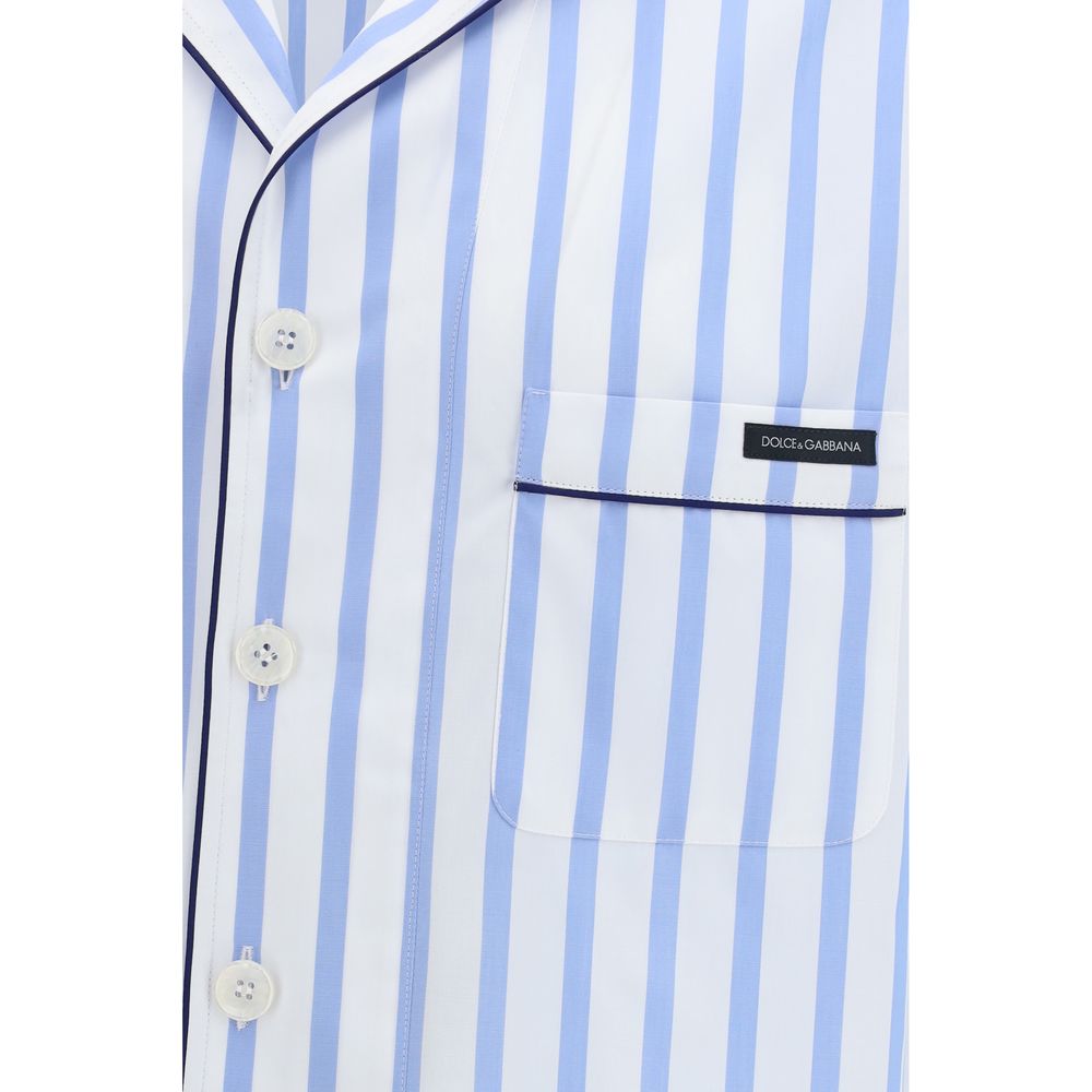 Elevate your wardrobe with the Dolce & Gabbana Multicolor Cotton Pattern Shirt, a masterpiece of artisanal craftsmanship, where luxurious cotton meets sophisticated design for timeless elegance.