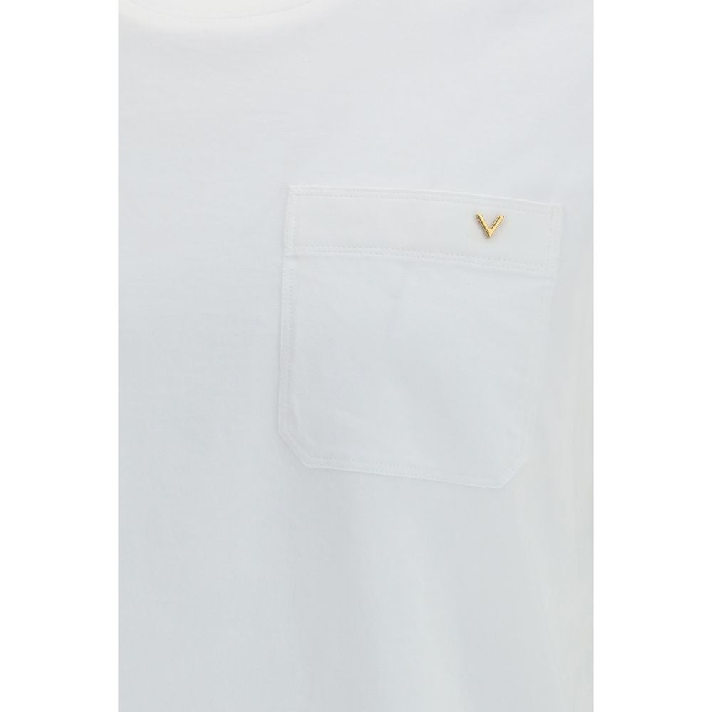 Elevate your wardrobe with the Valentino White Cotton T-Shirt, crafted from the finest cotton for unmatched comfort and timeless sophistication, perfect for any occasion.