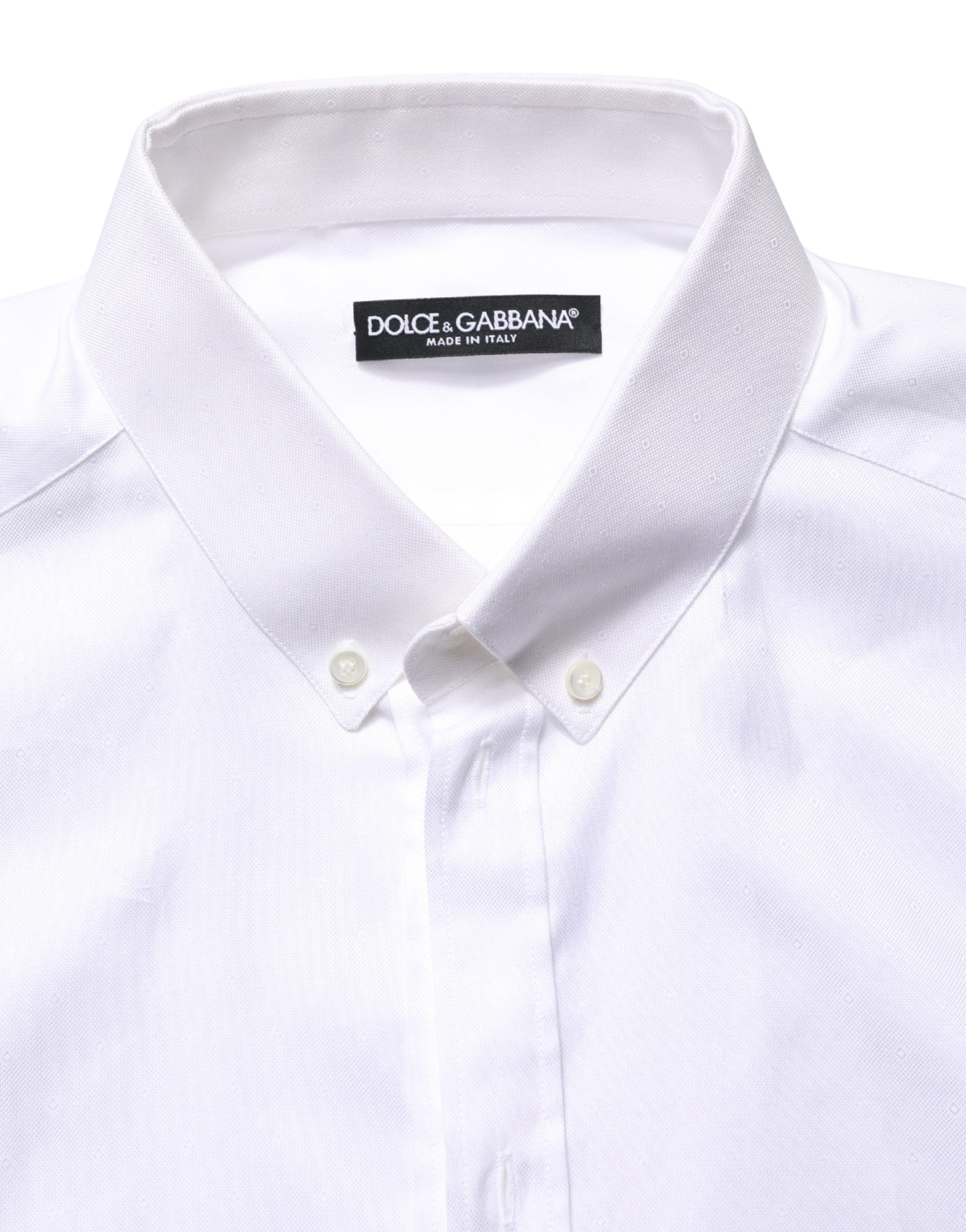 Indulge in the exquisite allure of Dolce & Gabbana's White Cotton Short Sleeves Button Down Shirt, where Italian craftsmanship meets timeless sophistication for the discerning wardrobe.