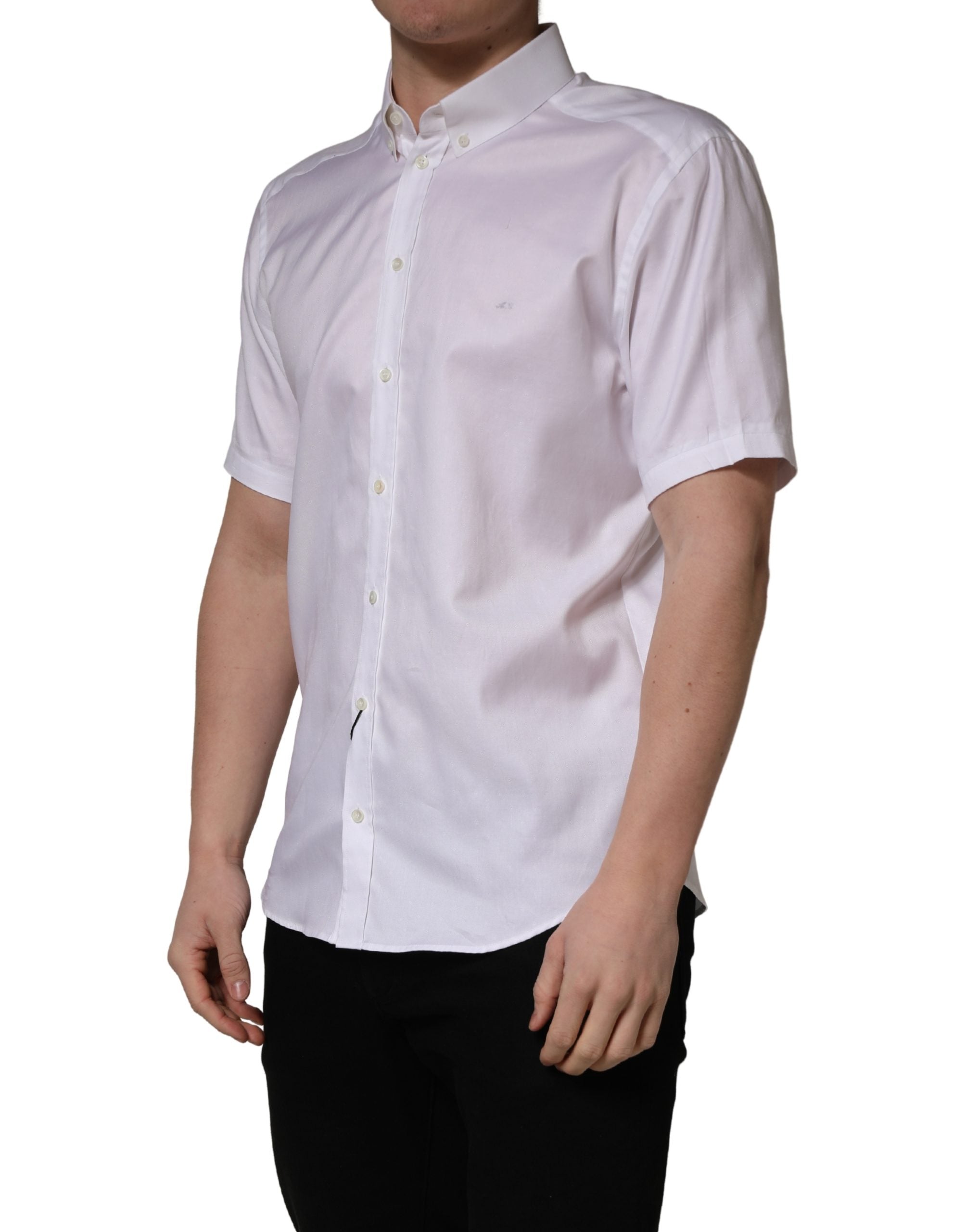 Indulge in the elegance of Dolce & Gabbana's White Cotton Short Sleeves Button Down Shirt, a masterpiece of Italian craftsmanship that embodies timeless sophistication and luxurious comfort.