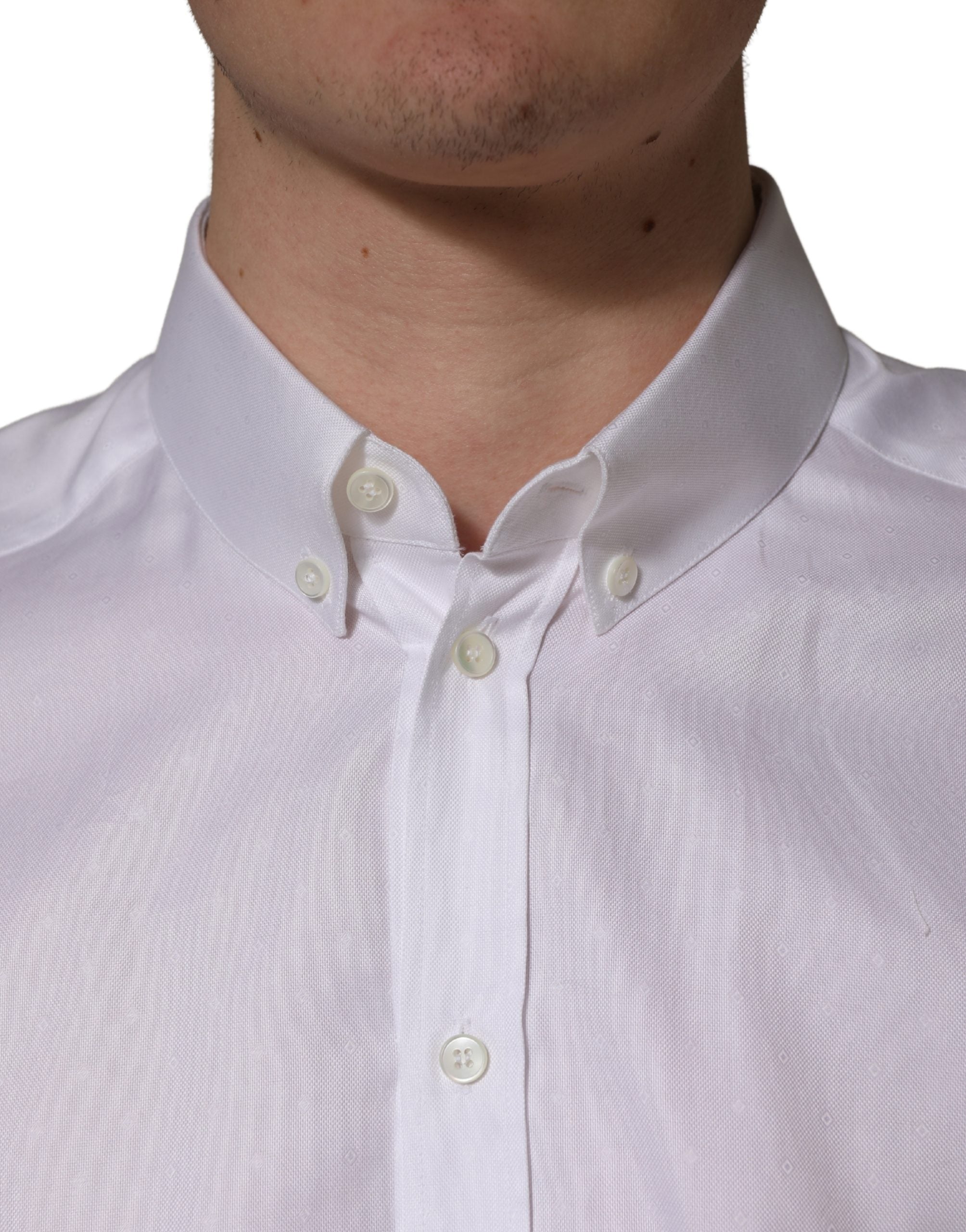 Elevate your wardrobe with Dolce & Gabbana's White Cotton Short Sleeves Button Down Shirt, a testament to Italian craftsmanship and timeless elegance for discerning tastes.