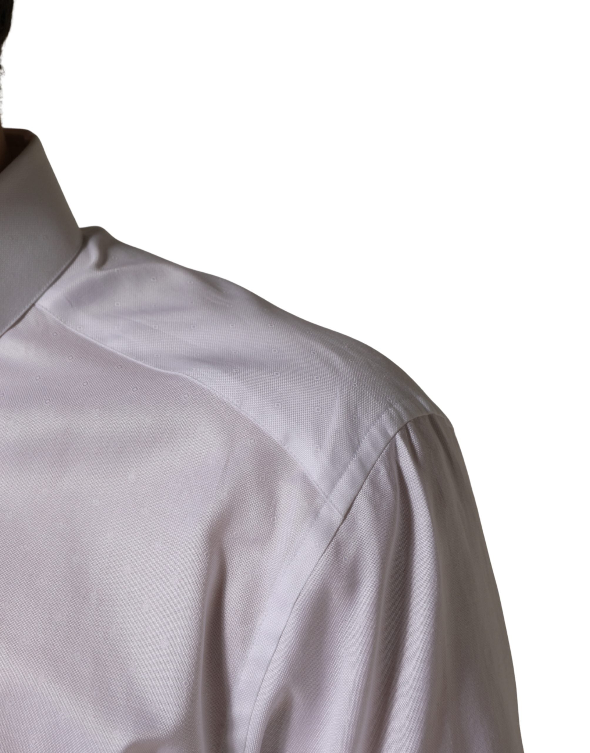 Discover the exquisite Dolce & Gabbana White Cotton Short Sleeves Button Down Shirt, a testament to Italian craftsmanship that elevates your wardrobe with timeless sophistication.