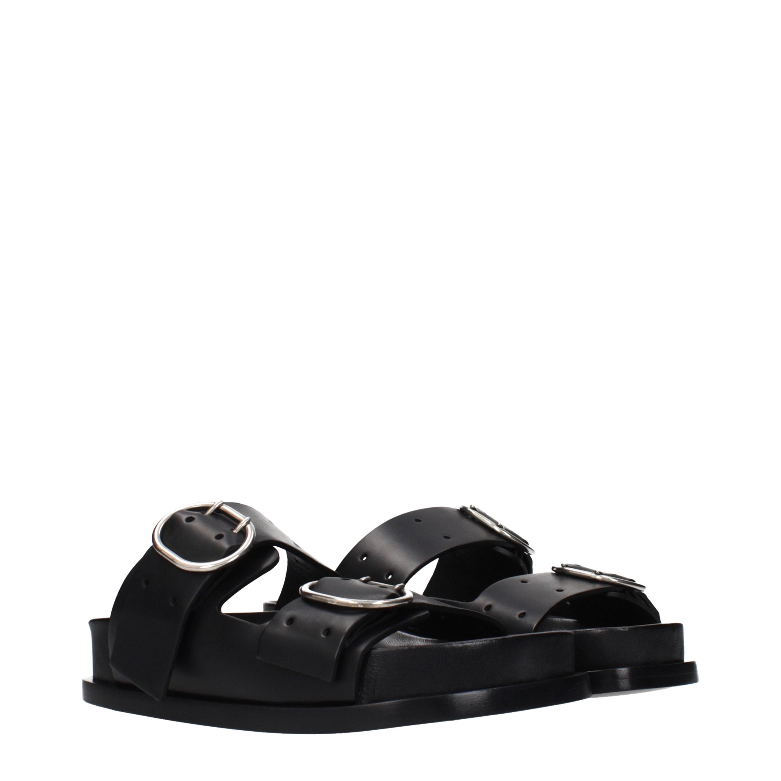 Indulge in the exquisite Jil Sander Black Leather Slippers, where luxurious craftsmanship meets timeless elegance, perfect for the discerning individual seeking refined comfort.