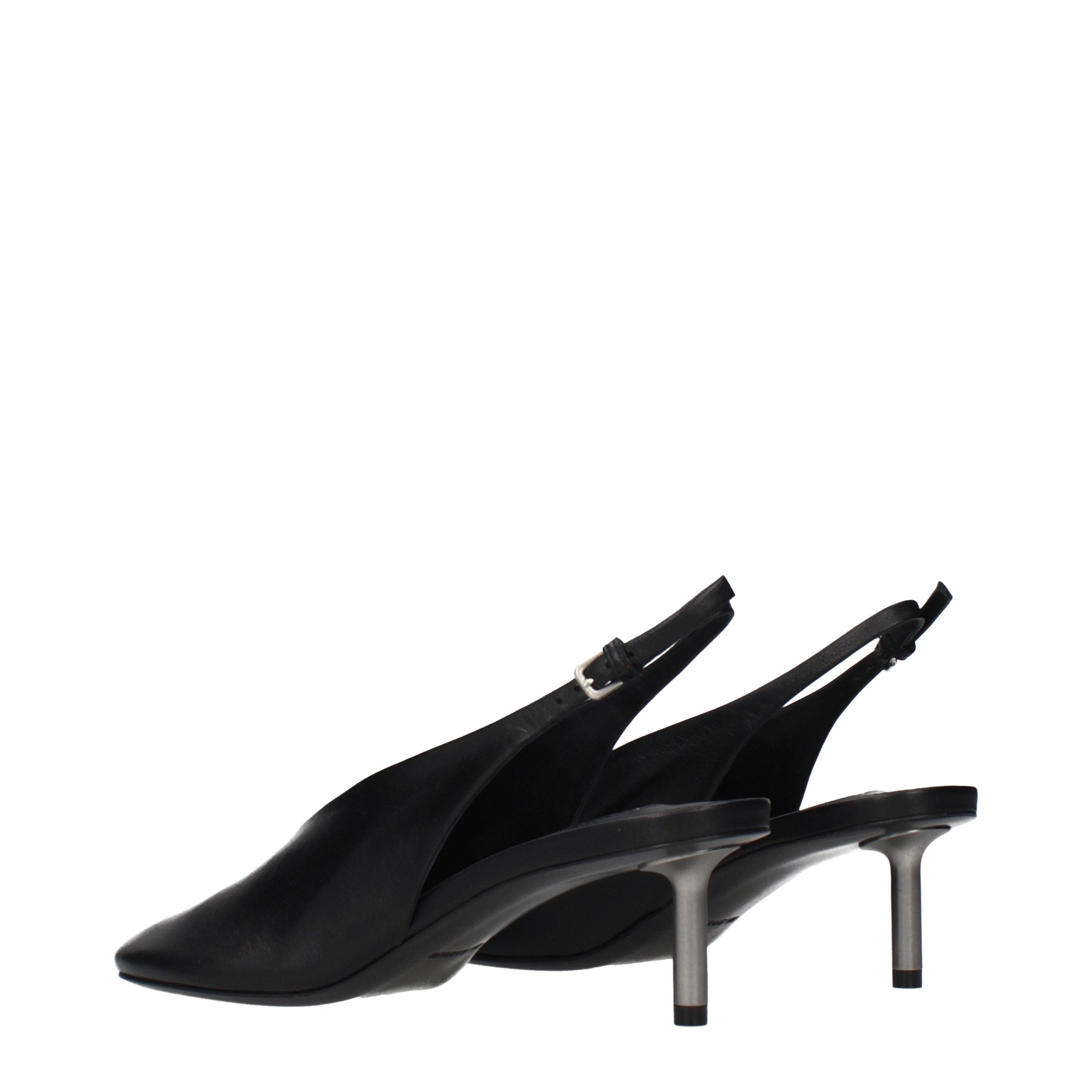 Experience the allure of Jil Sander Black Leather Pumps, where exquisite craftsmanship meets timeless elegance, perfect for those who embody sophistication and style.