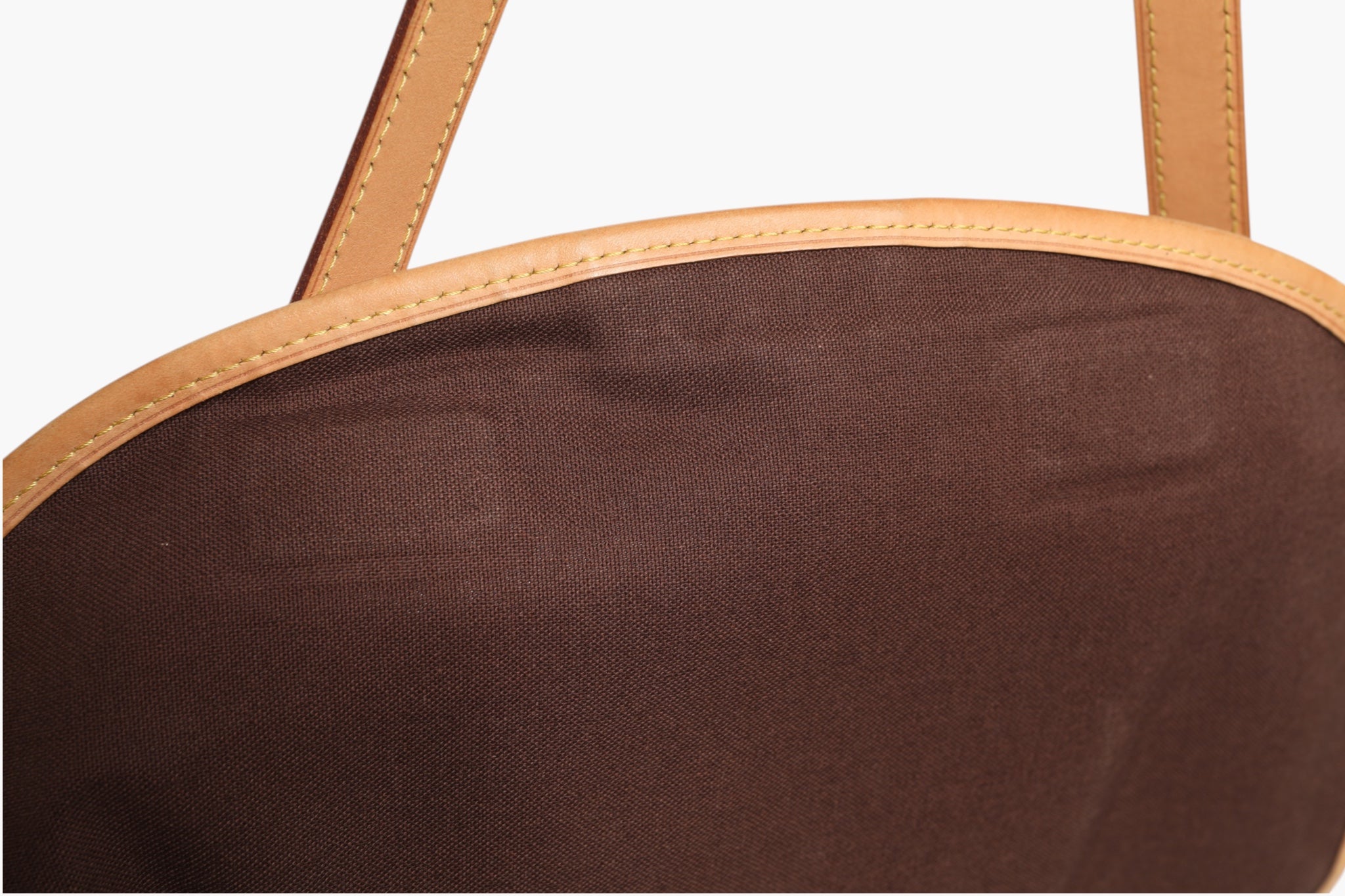 Indulge in the exquisite Louis Vuitton Monogram Canvas Menilmontant MM, a timeless masterpiece that embodies luxury, elegance, and sophisticated craftsmanship.