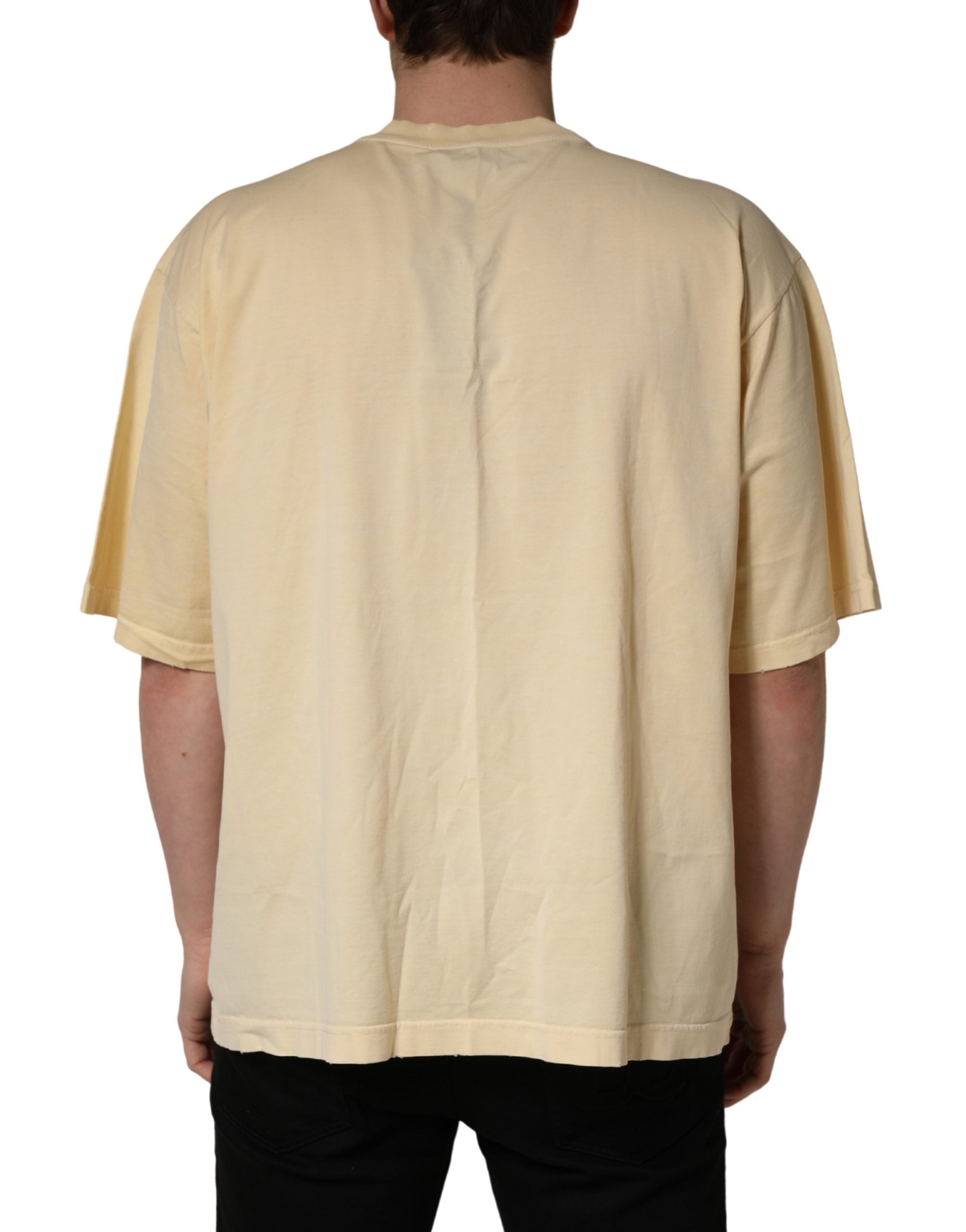 Elevate your wardrobe with the Dolce & Gabbana Yellow Logo Print Cotton Crew Neck T-shirt, a testament to Italian craftsmanship and timeless elegance, perfect for any occasion.