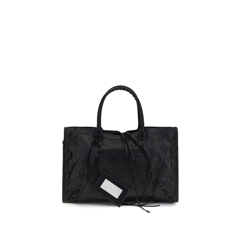Discover the Balenciaga Black Lamb Ovis Aries Shoulder Bag, a masterpiece of Arena lambskin craftsmanship, embodying timeless elegance and versatile luxury for the discerning individual.