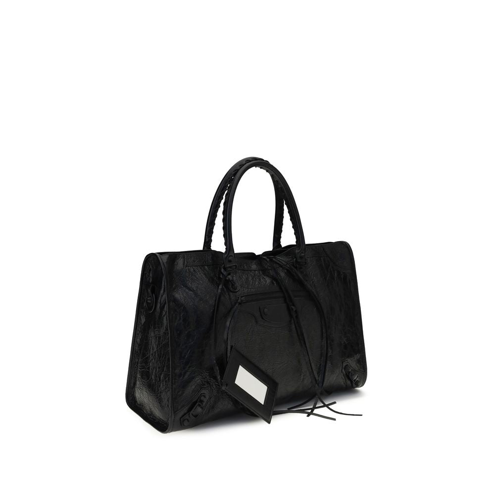 Discover the Balenciaga Black Lamb Ovis Aries Aries Shoulder Bag, a masterpiece of Arena lambskin craftsmanship, blending luxury with versatility for the discerning individual.