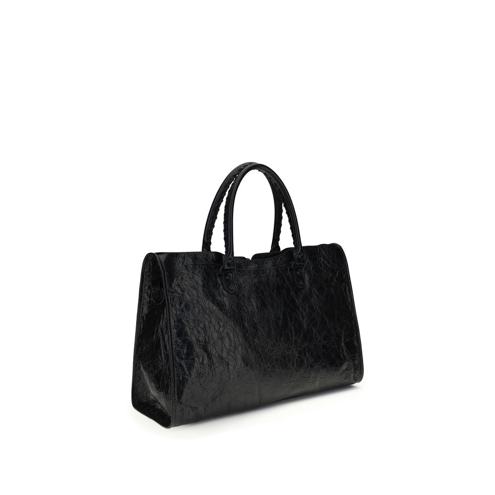 Discover the Balenciaga Black Lamb Ovis Aries Aries Shoulder Bag, a masterpiece of Arena lambskin, blending exquisite craftsmanship with timeless elegance for the discerning connoisseur.