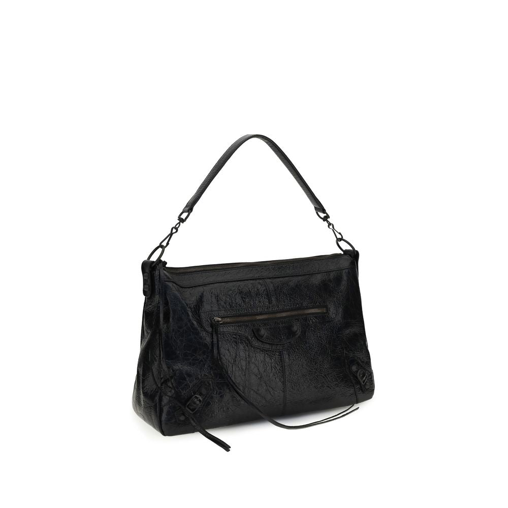 Elevate your style with the Balenciaga Black Lamb Ovis Aries Aries Shoulder Bag, a masterpiece of exquisite craftsmanship and timeless elegance for the discerning individual.