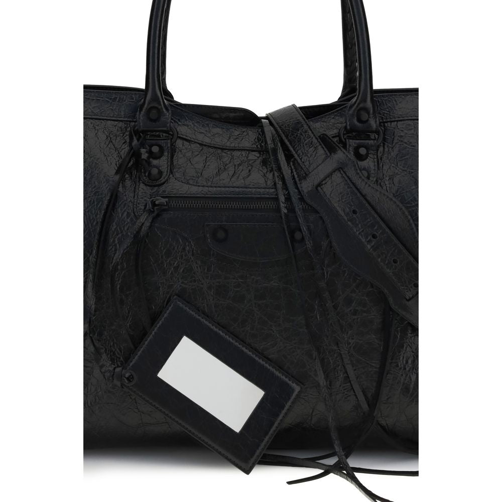 Experience the allure of the Balenciaga Black Lamb Ovis Aries Aries Shoulder Bag, crafted from luxurious Arena lambskin, a perfect blend of elegance and modern sophistication.