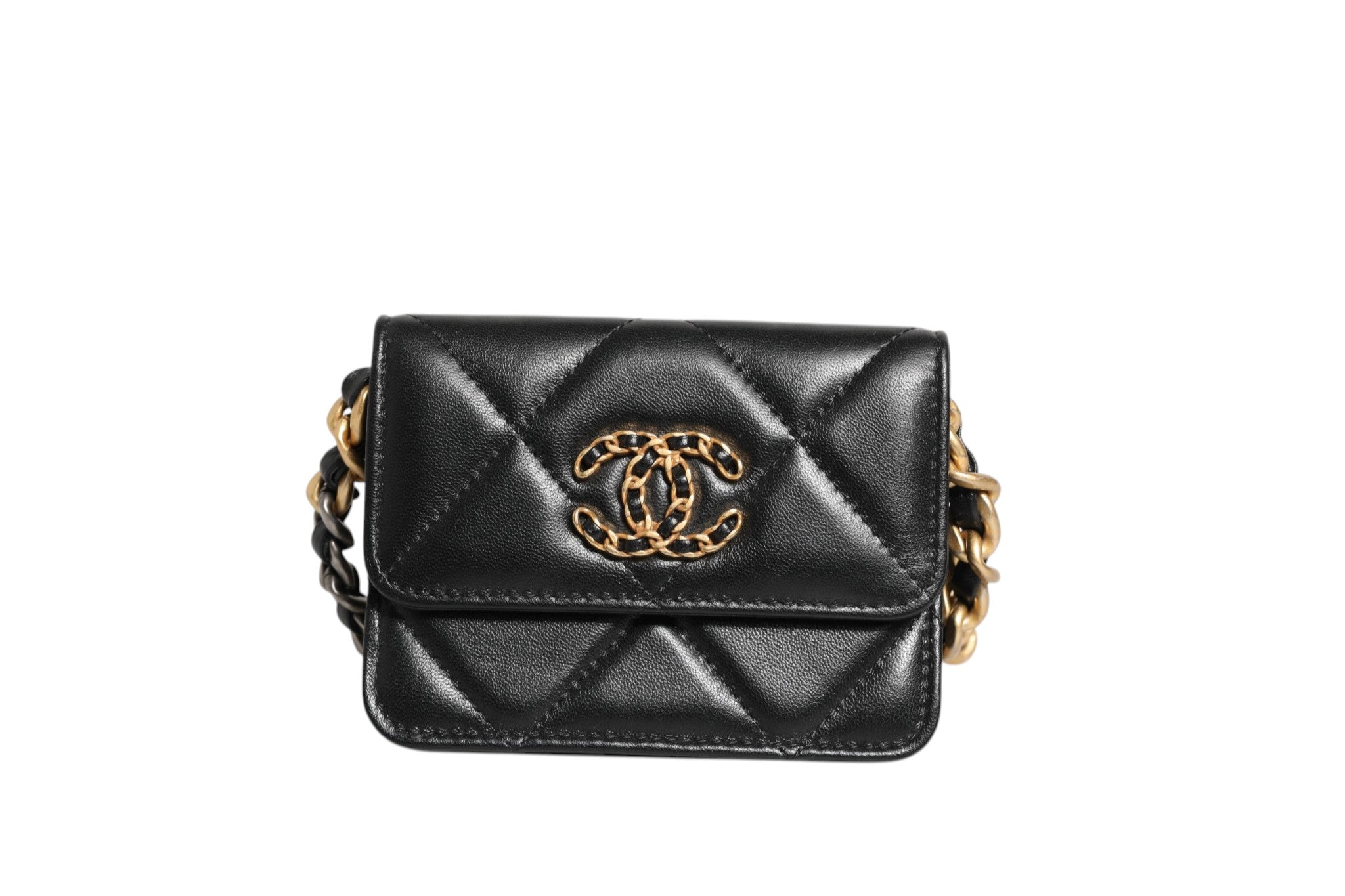 Discover the Chanel 19 Flap Coin Purse, a timeless piece in quilted leather, embodying sophistication and artistry for those who appreciate luxury and elegance.