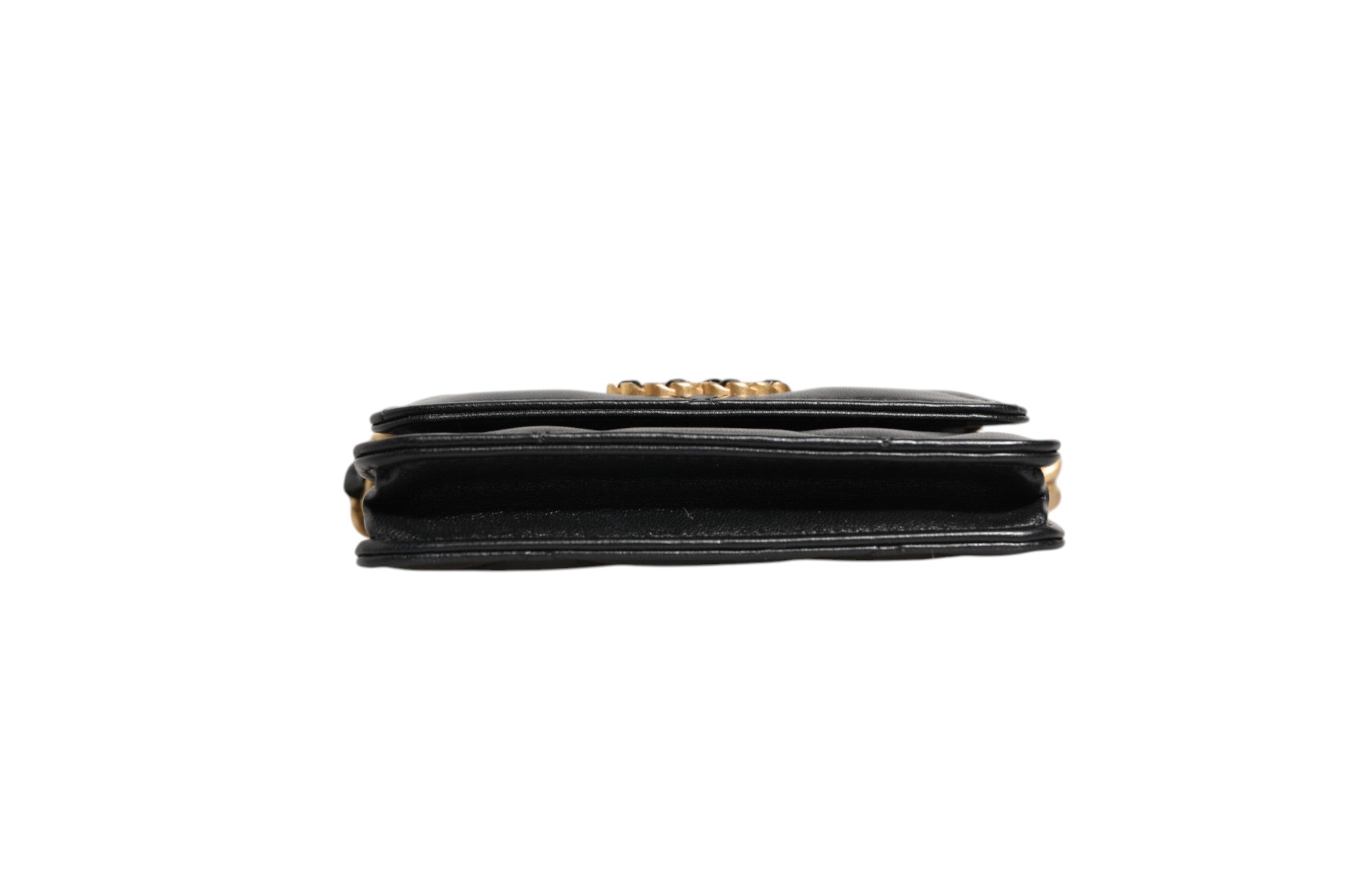 Discover the Chanel 19 Flap Coin Purse, a masterpiece in quilted leather, embodying timeless elegance and exquisite craftsmanship for the discerning connoisseur.