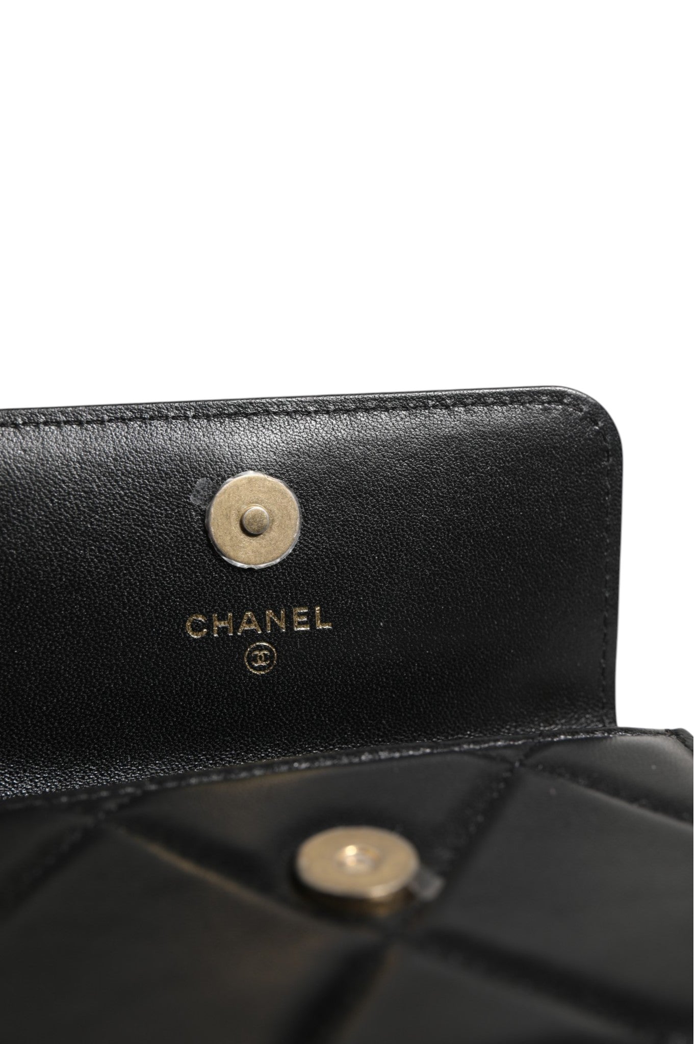Discover the Chanel 19 Flap Coin Purse, a luxurious quilted leather accessory that embodies timeless elegance and impeccable craftsmanship, perfect for any sophisticated occasion.