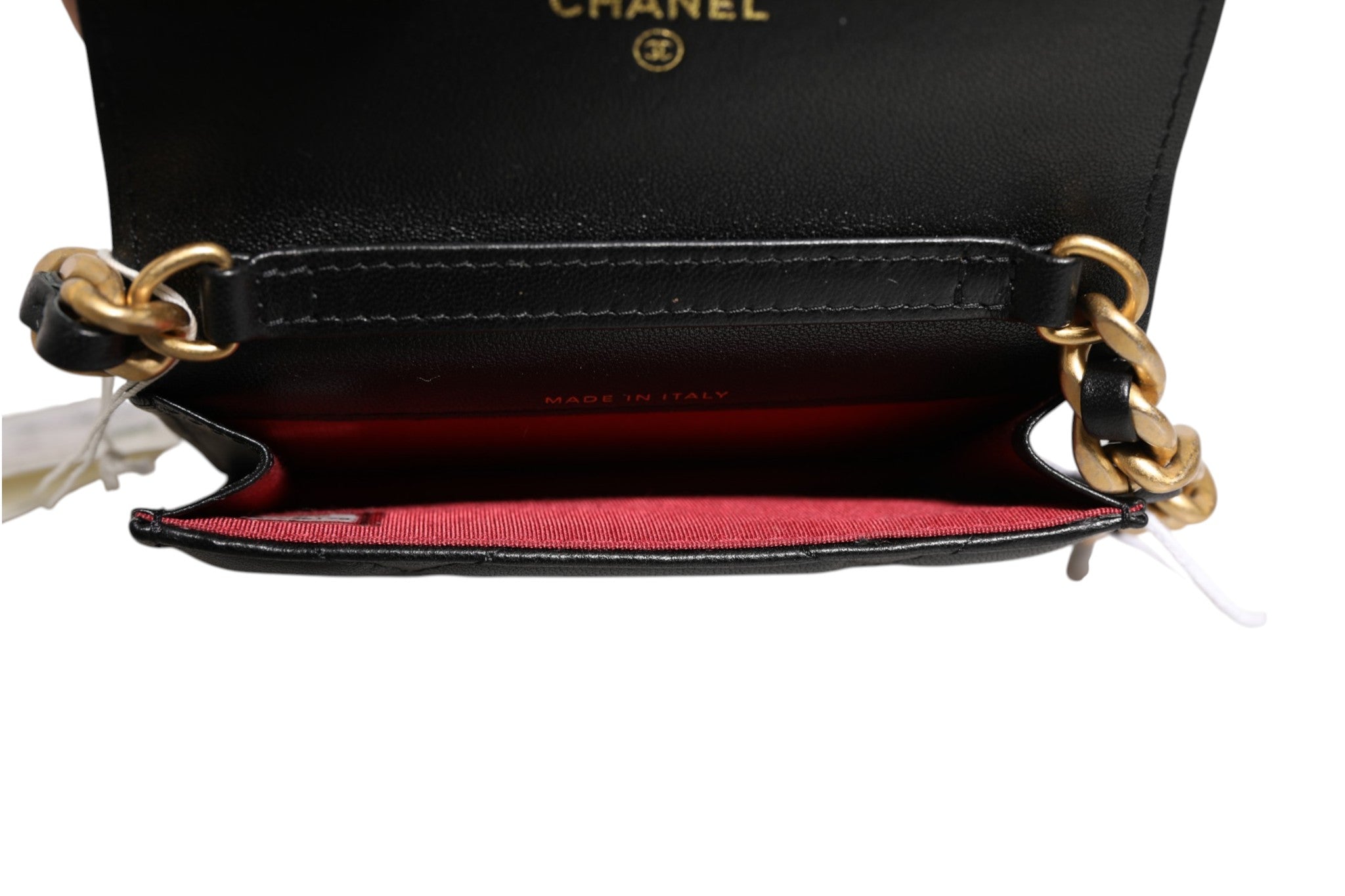 Discover the Chanel 19 Flap Coin Purse, a masterpiece of quilted leather that embodies timeless elegance and exquisite craftsmanship, perfect for the discerning connoisseur.