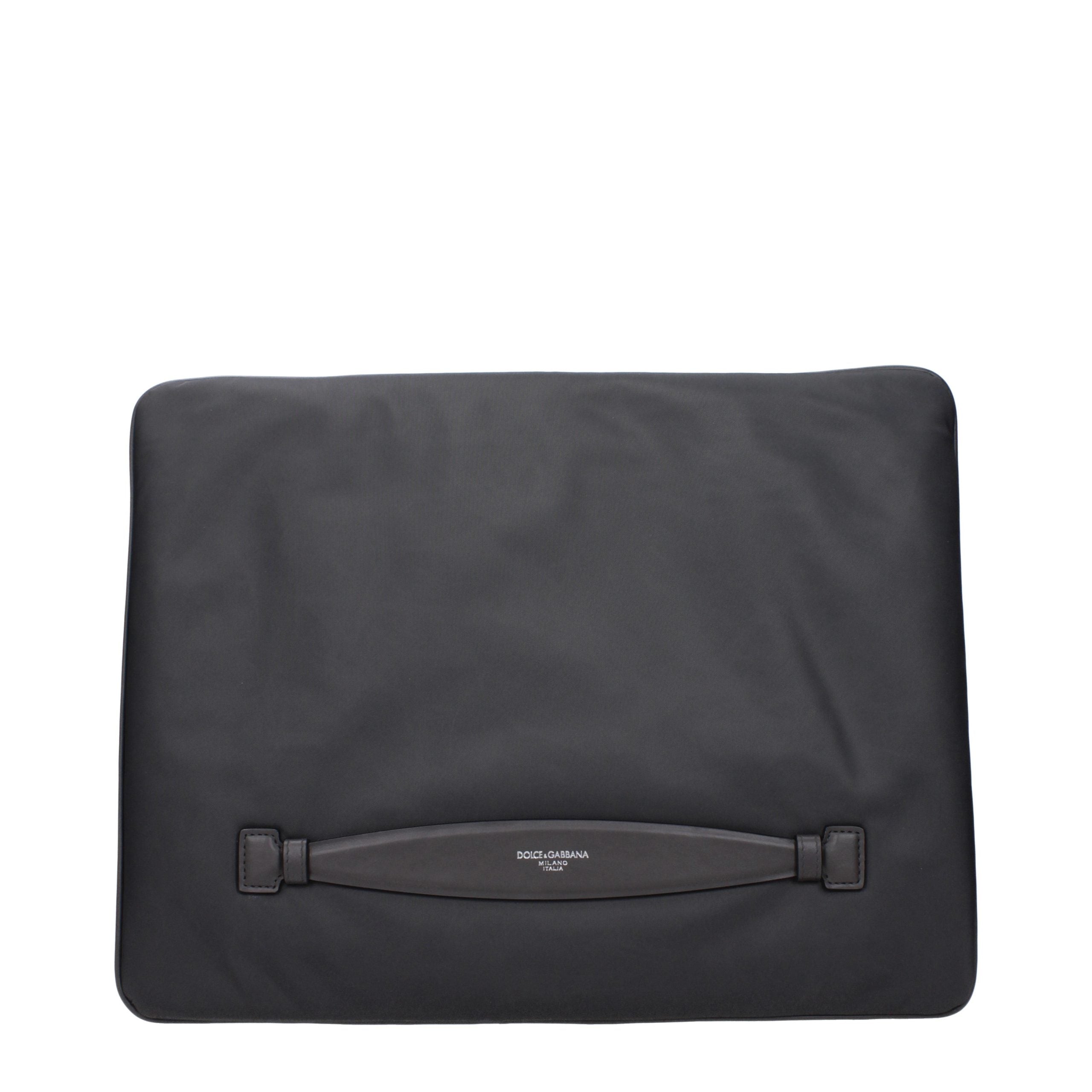 Elevate your elegance with the Dolce & Gabbana Gray Fabric Clutch Bag, a timeless luxury accessory that embodies refined craftsmanship and sophisticated allure for any occasion.