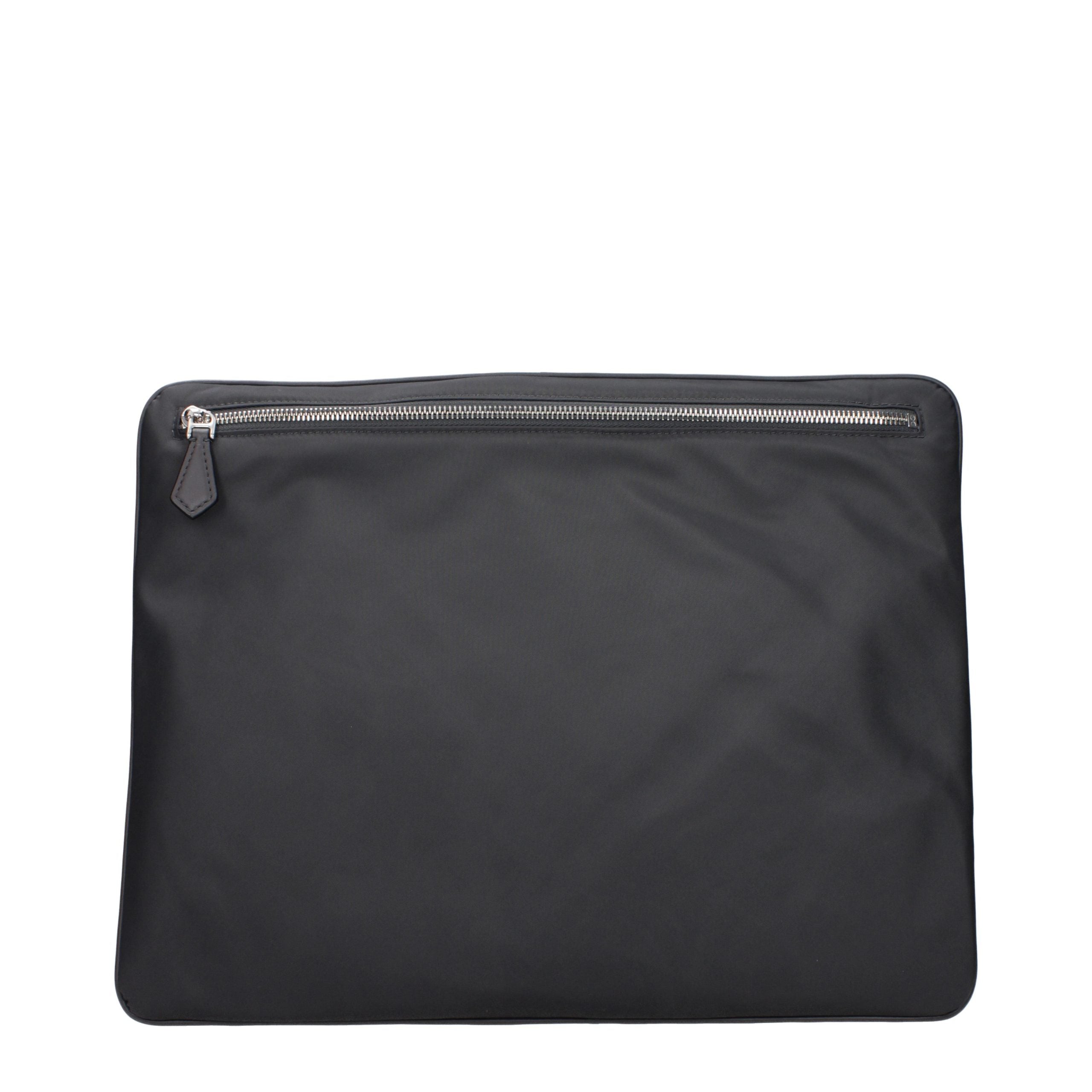 Indulge in the sophistication of the Dolce & Gabbana Gray Fabric Clutch Bag, a timeless accessory that embodies luxury and refined craftsmanship for any occasion.
