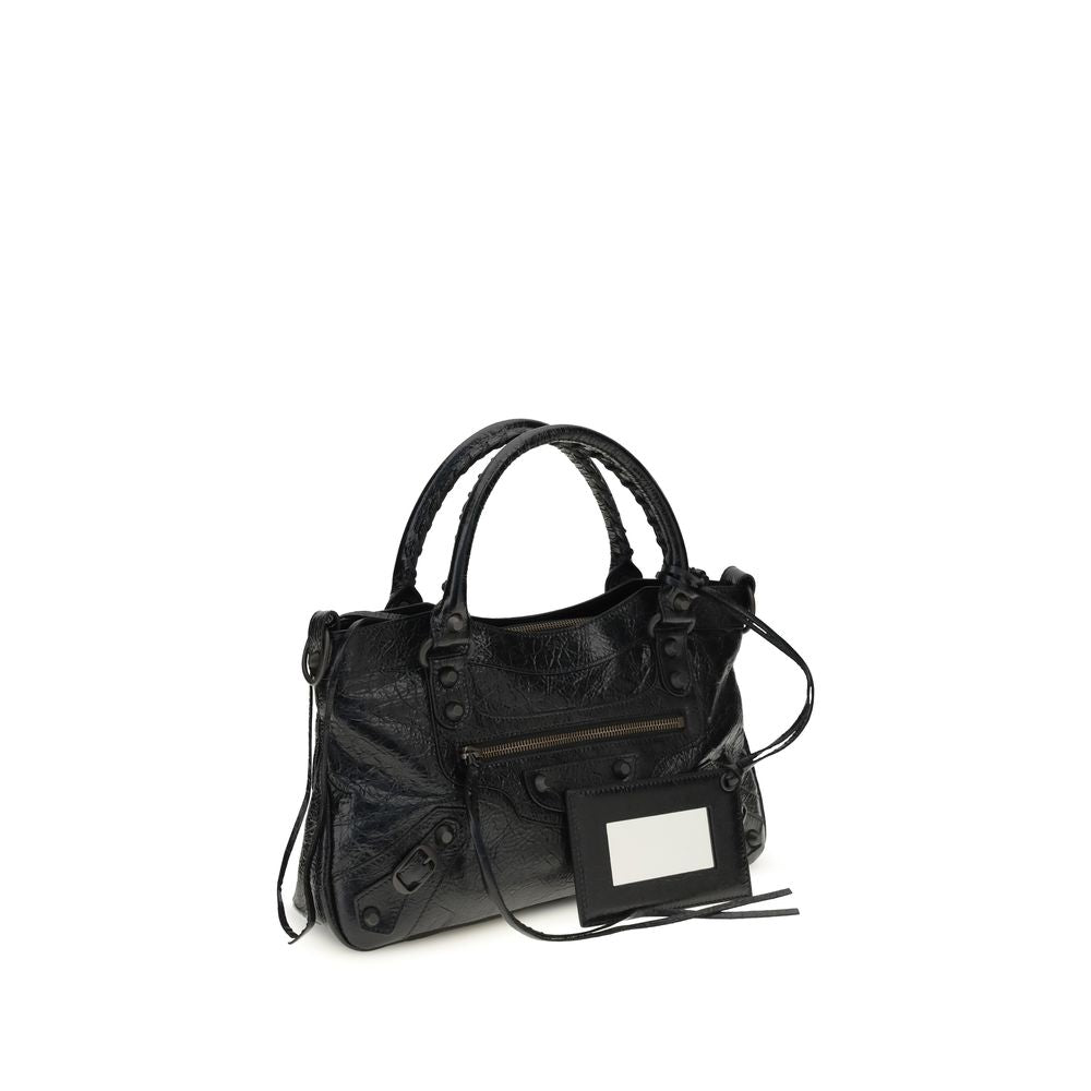 Elevate your style with the Balenciaga Black Lamb Ovis Aries Aries Shoulder Bag, a symbol of luxury and sophistication, crafted from premium lamb leather for the discerning connoisseur.