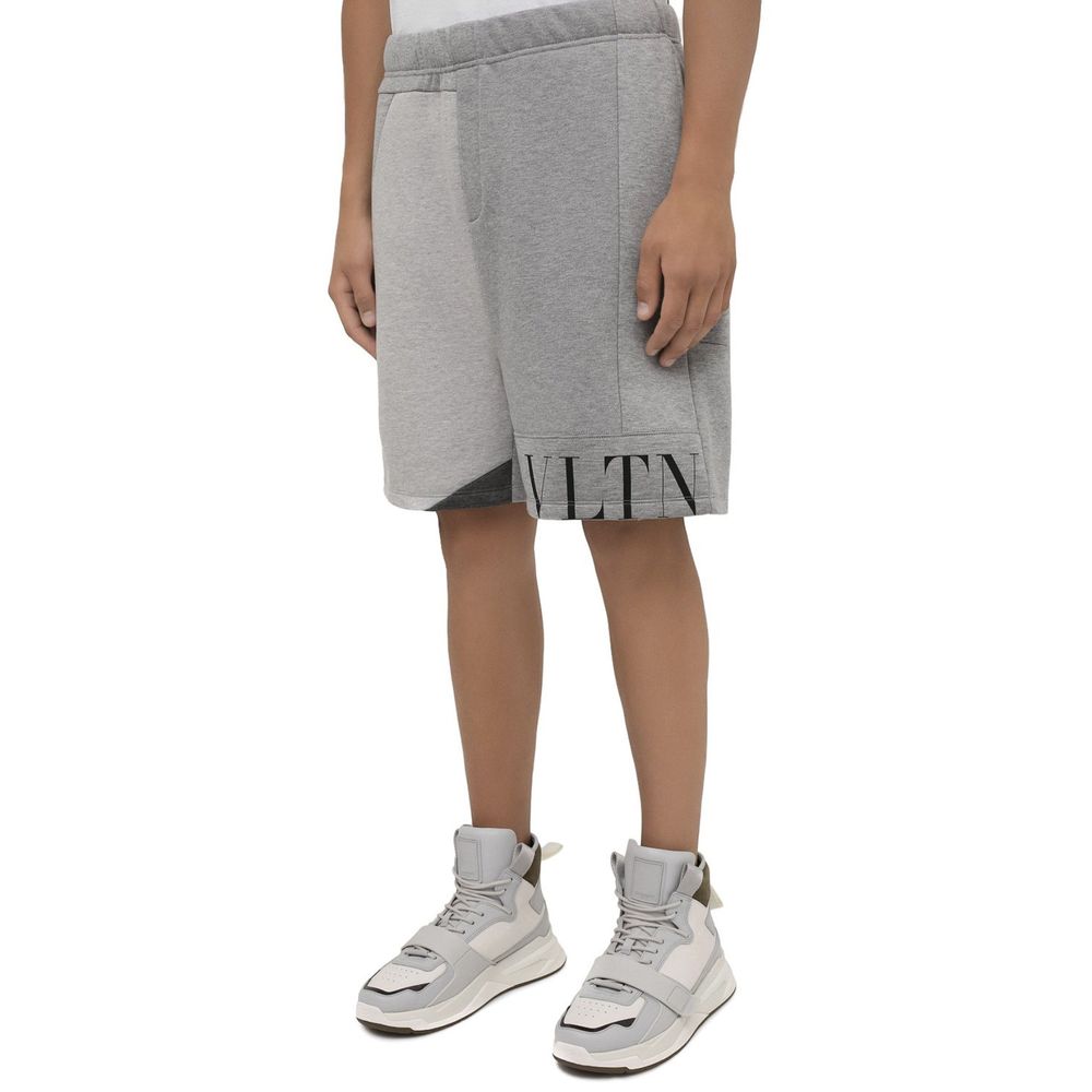 Experience the elegance of Valentino Gray Modal Shorts, crafted from sumptuous 100% modal. Elevate your style with Italian craftsmanship that embodies luxury and sophistication.