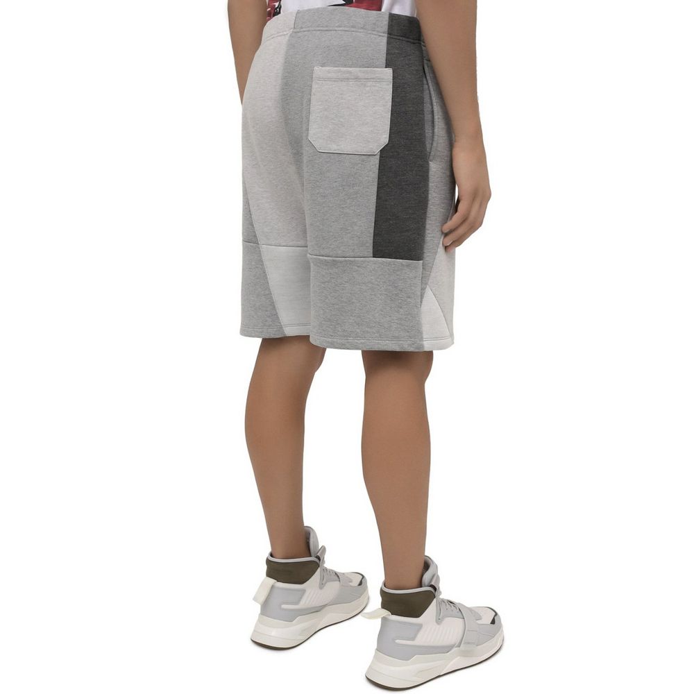 Indulge in the exquisite Valentino Gray Modal Shorts, crafted from 100% modal for unparalleled comfort and elegance, embodying luxury for the discerning individual.