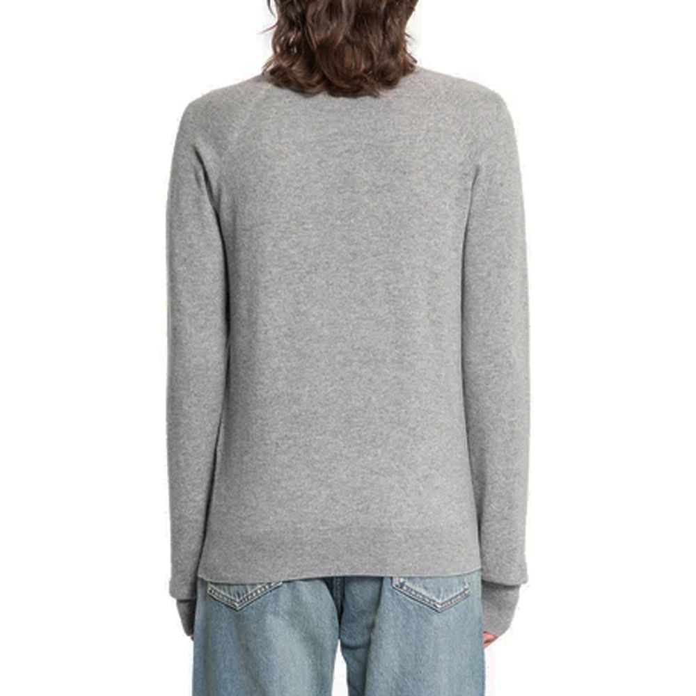 Indulge in the exquisite Saint Laurent Gray Cashmere Sweater, crafted from 100% cashmere, embodying timeless elegance and luxurious sophistication for discerning tastes.