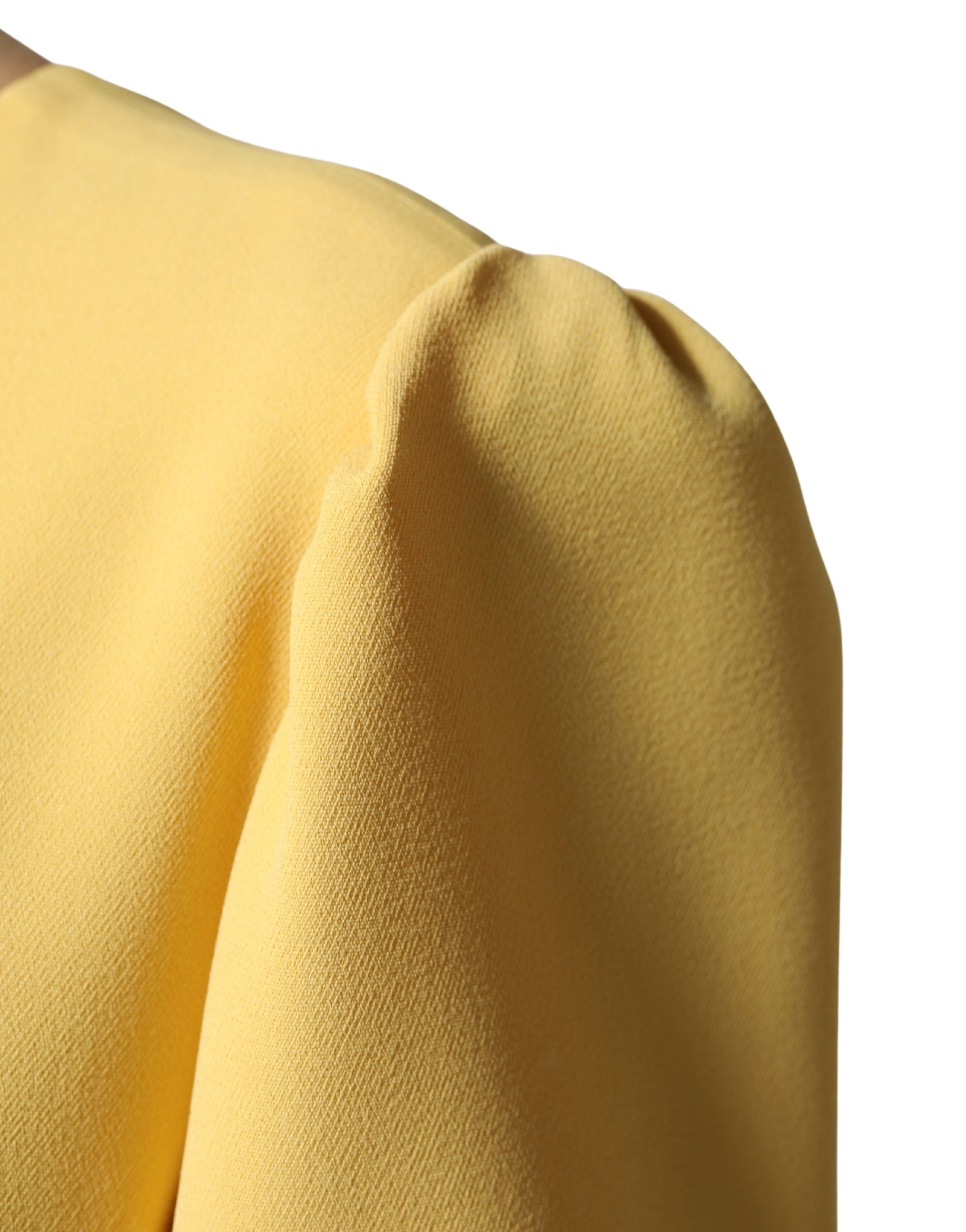 Indulge in the opulence of the Dolce & Gabbana Yellow Short-Sleeved Crew Neck Midi Dress, a masterpiece of Italian craftsmanship that embodies timeless elegance and sophistication.