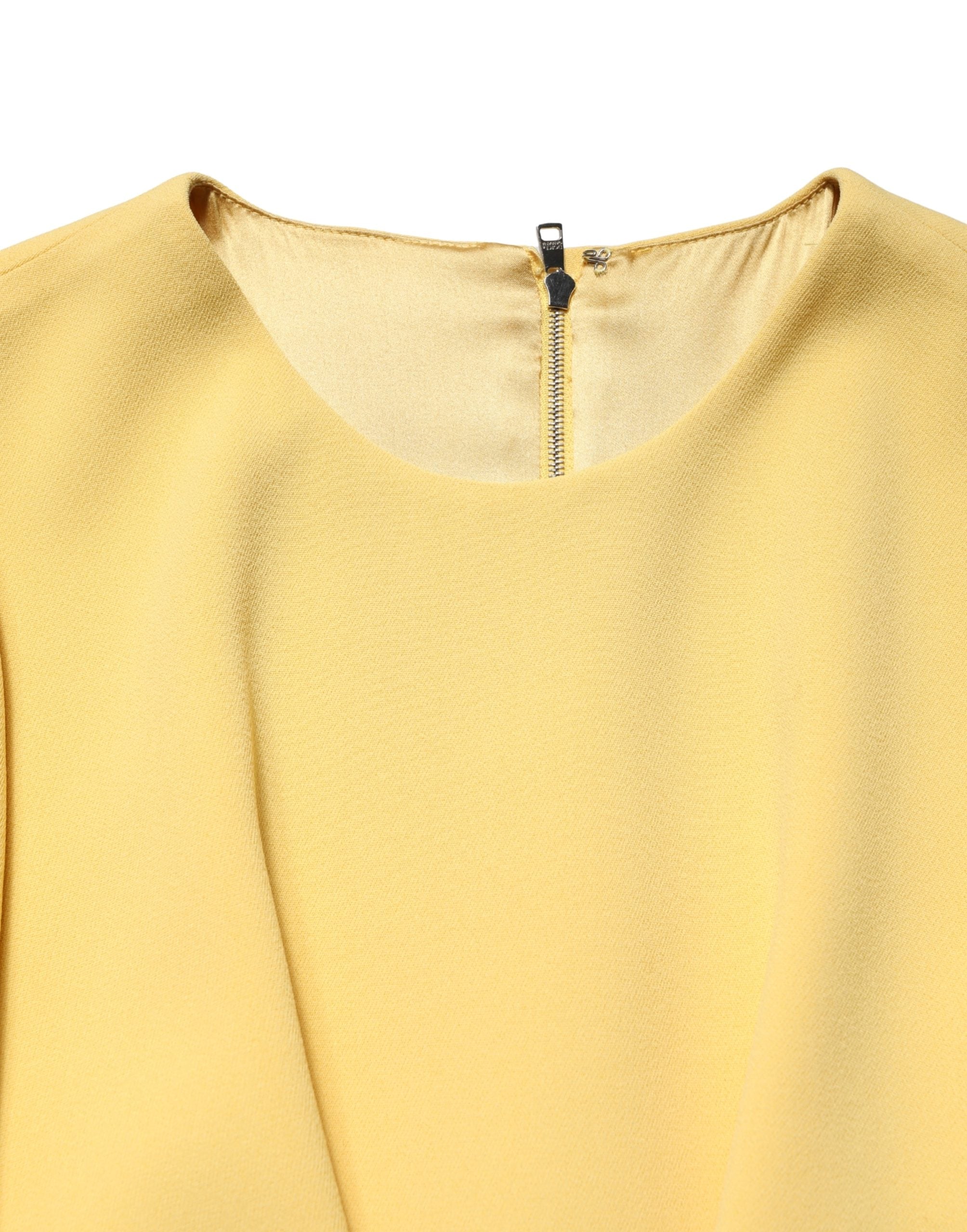 Indulge in the exquisite Dolce & Gabbana Yellow Short-Sleeved Midi Dress, where luxurious viscose and silk embrace timeless elegance for a captivating allure.