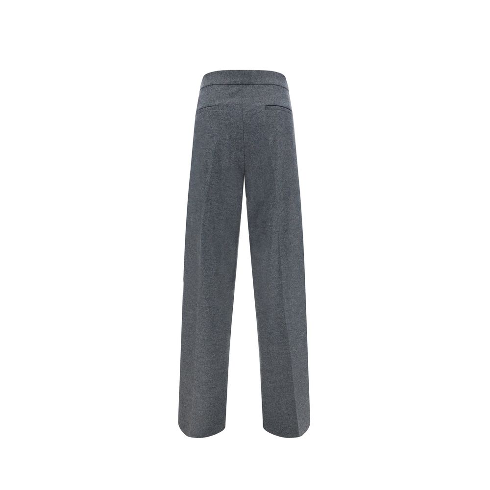 Discover the elegance of Jil Sander Gray Wool Casual Pants, crafted in Italy from luxurious 100% wool, embodying timeless sophistication for the discerning individual.