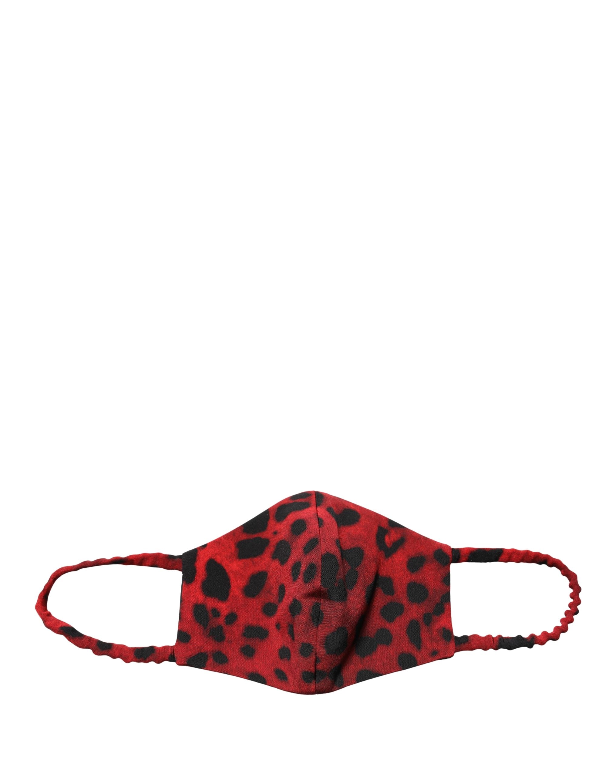 Indulge in the exquisite allure of Dolce & Gabbana's red leopard print sheath dress, crafted from luxurious silk, embodying timeless elegance and sophisticated charm.