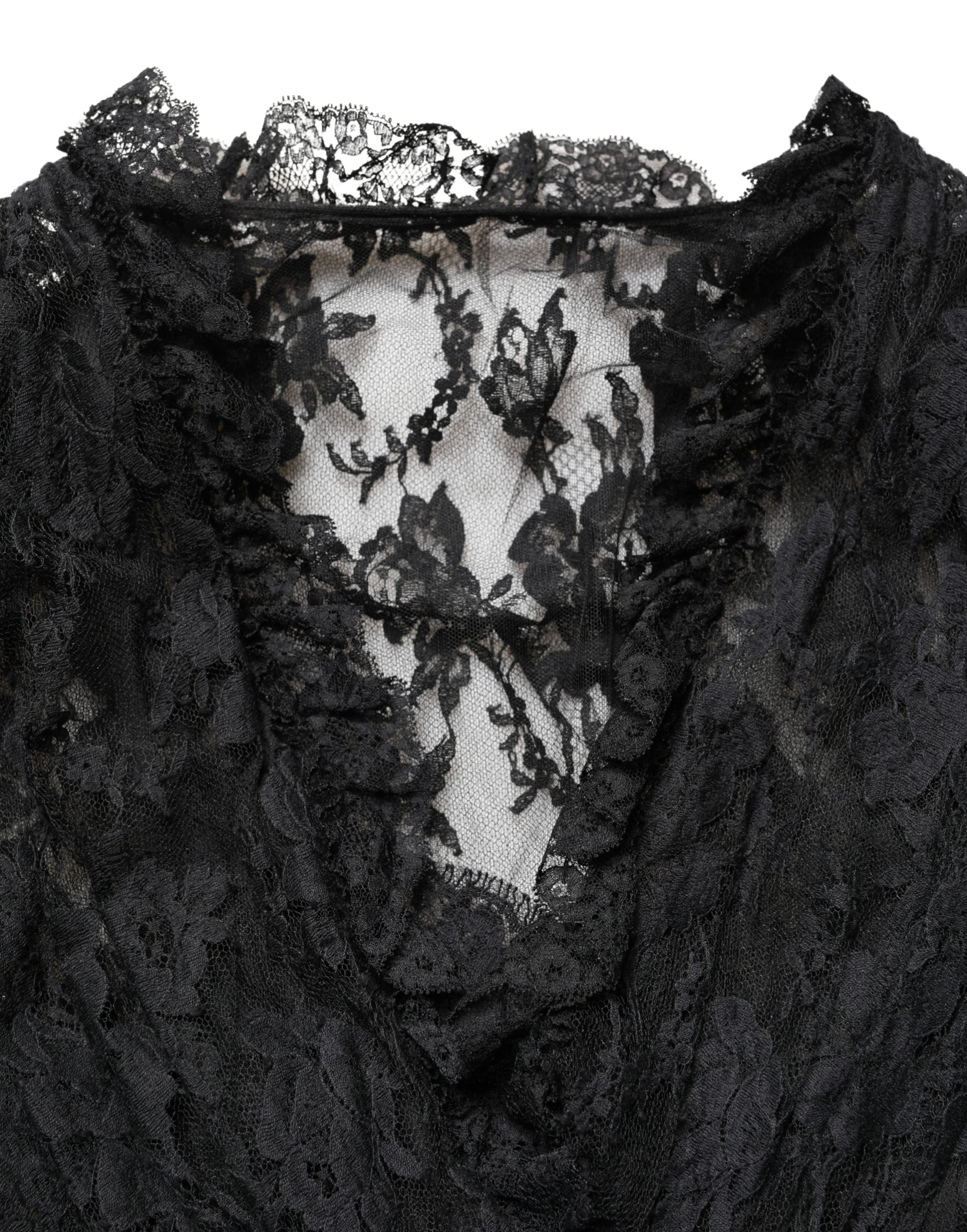 Indulge in the exquisite Dolce & Gabbana Black Lace A-line Evening Gown, a masterpiece of Italian craftsmanship that embodies timeless elegance and sophisticated allure.